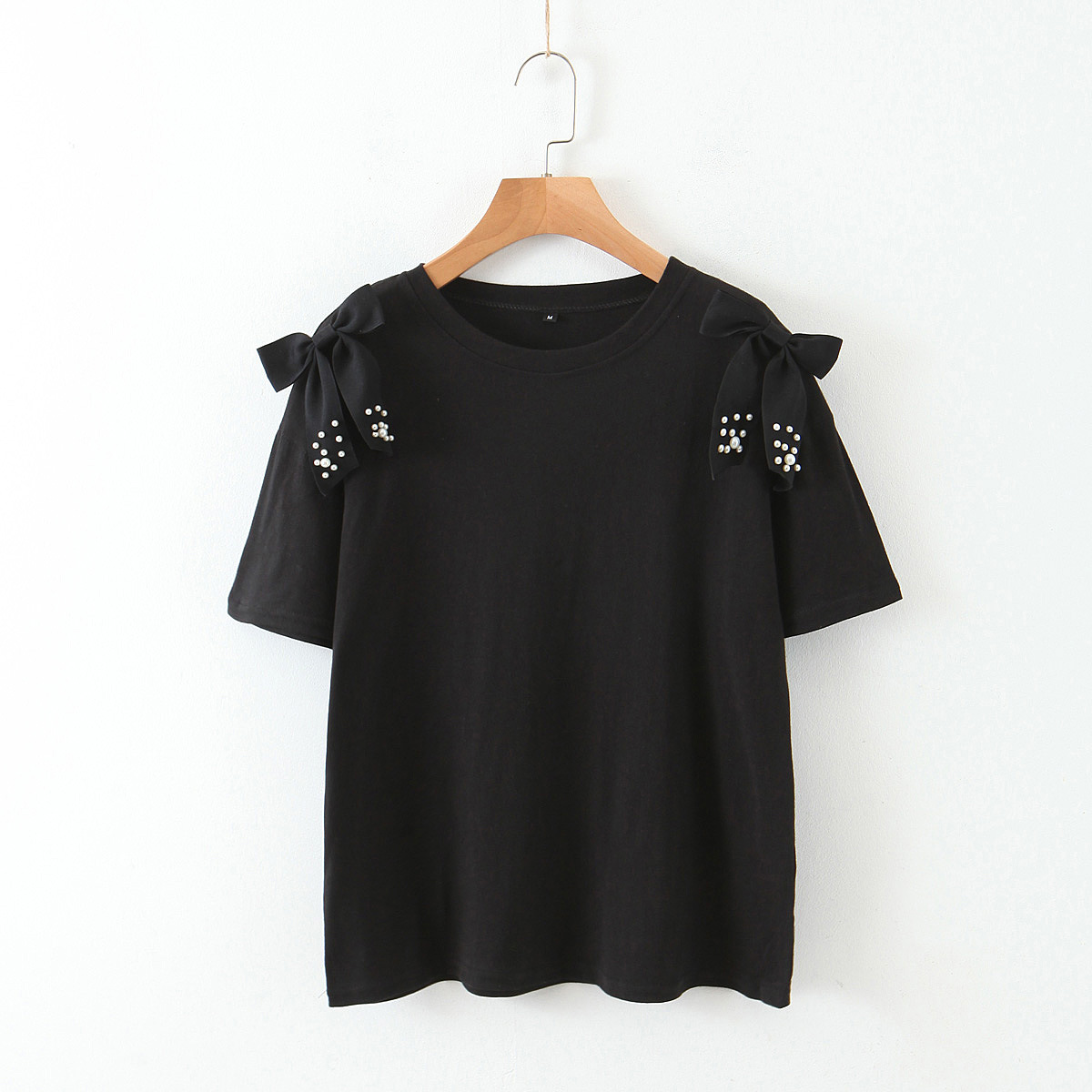 

Футболка женская Жемчуг, черный Berni Fashion (M) Черный