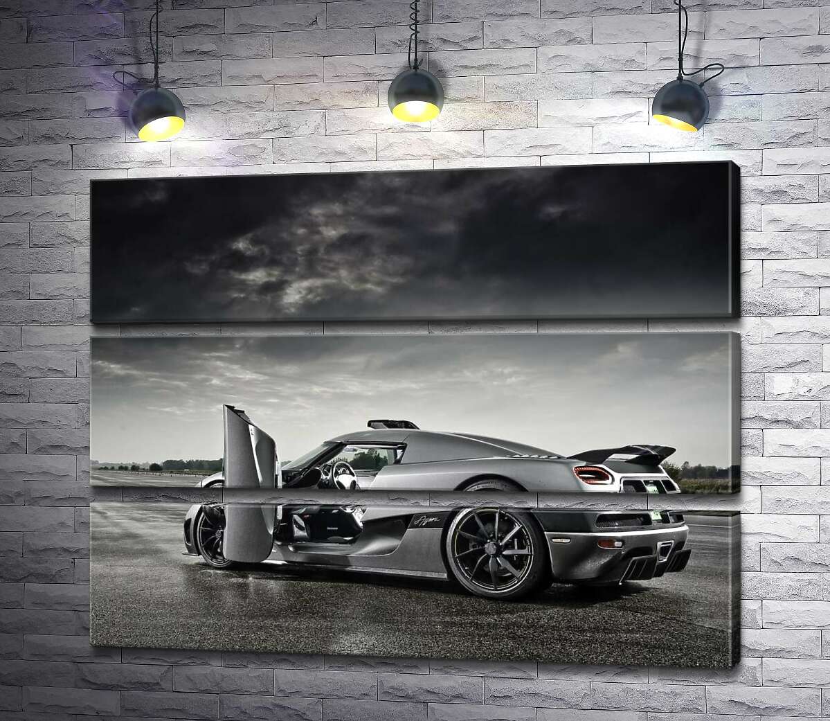 

Модульная картина ArtPoster Шведский гиперкар Koenigsegg Agera под переливами грозовых облаков 100x75 см Модуль №13