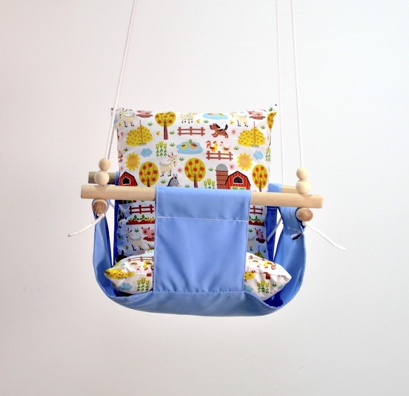 

Детская качеля из дерева подвесная Infancy Веселая ферма хлопковая голубая тканевая основа от 7 месяцев до 5 лет