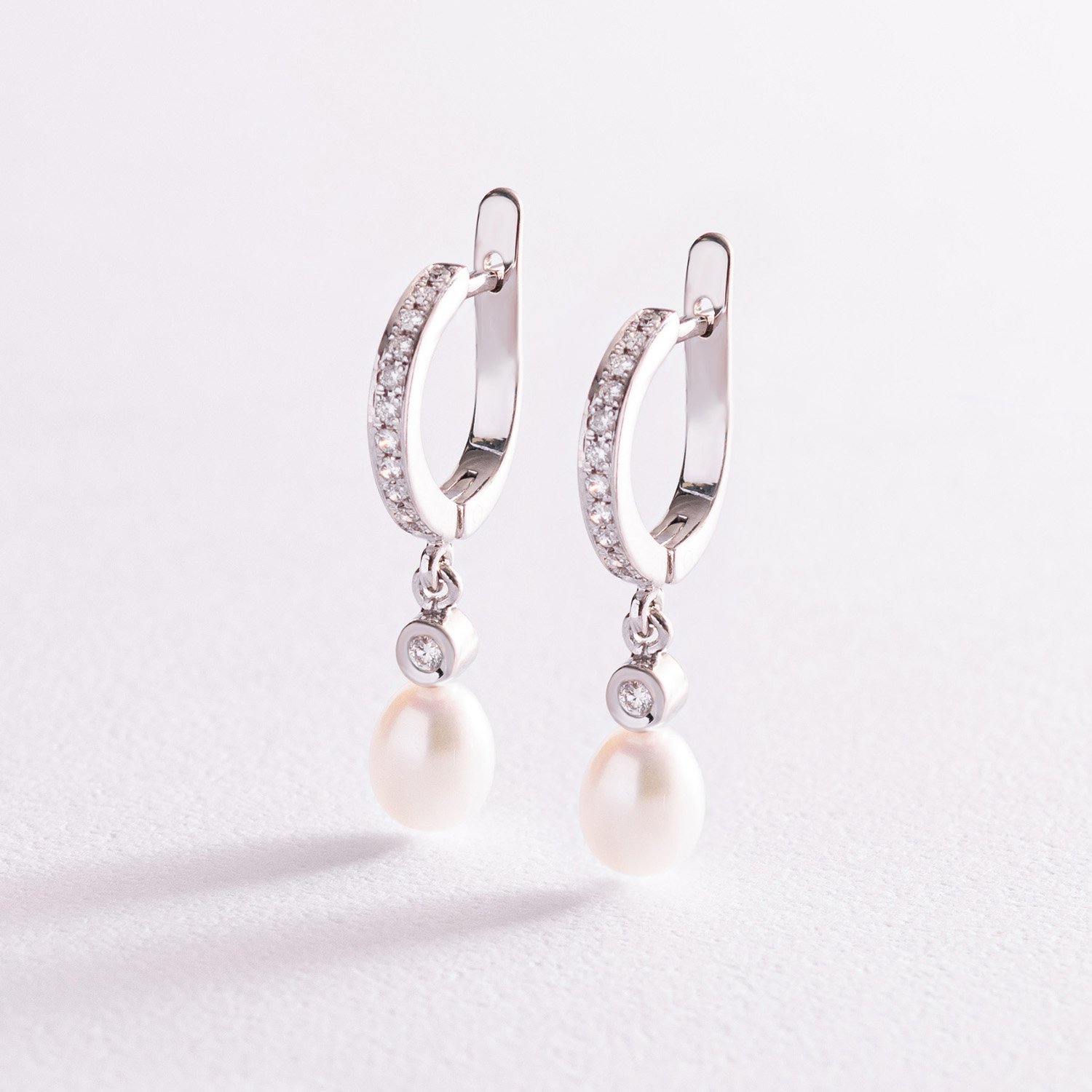 

Золотые серьги с жемчугом и бриллиантами сж2-4382 Оникс