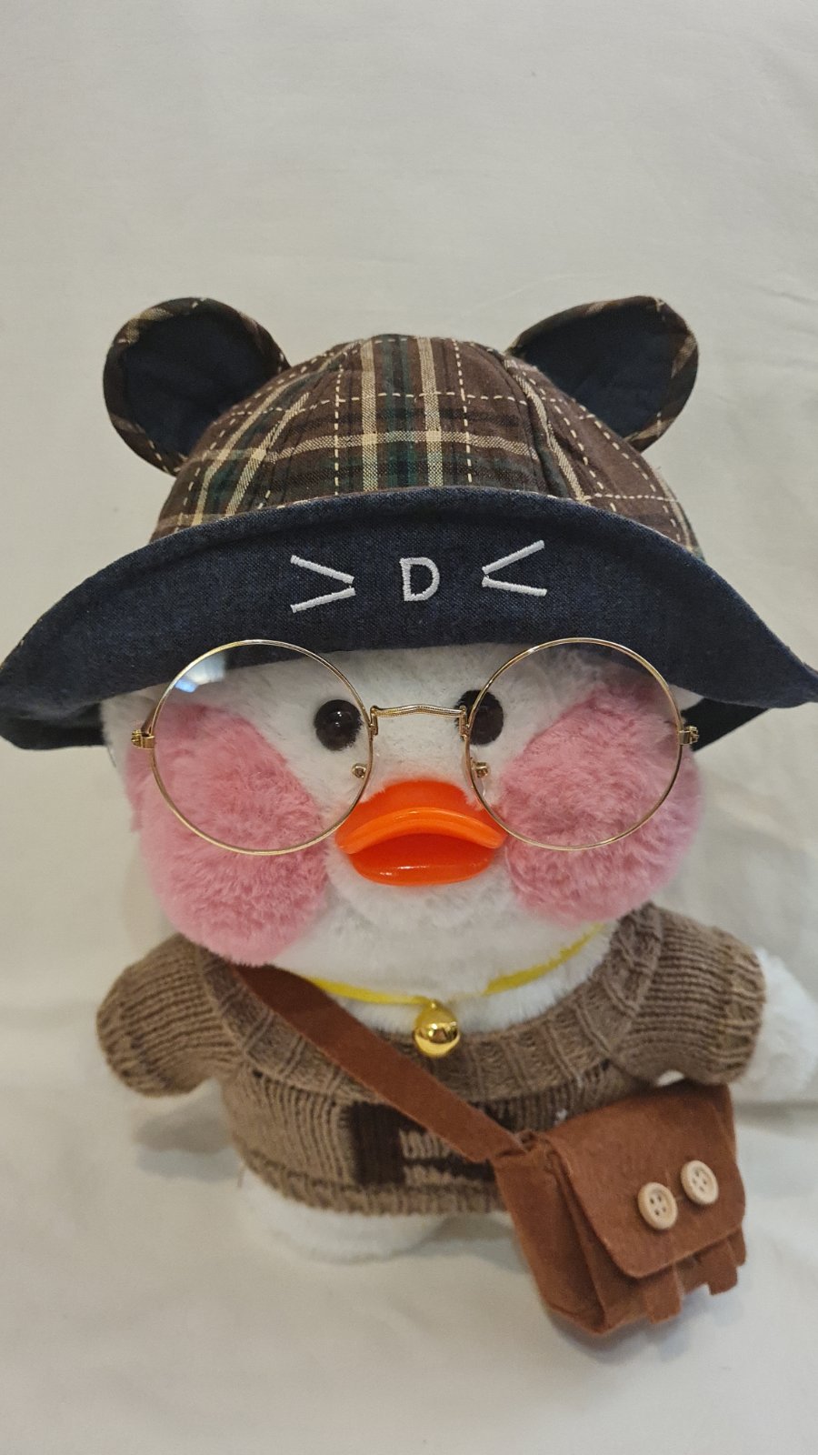 

Мягкая игрушка Плюшевая Лалафанфан Уточка Lalafanfan Duck в одежде 29 см белый коричневый шляпа