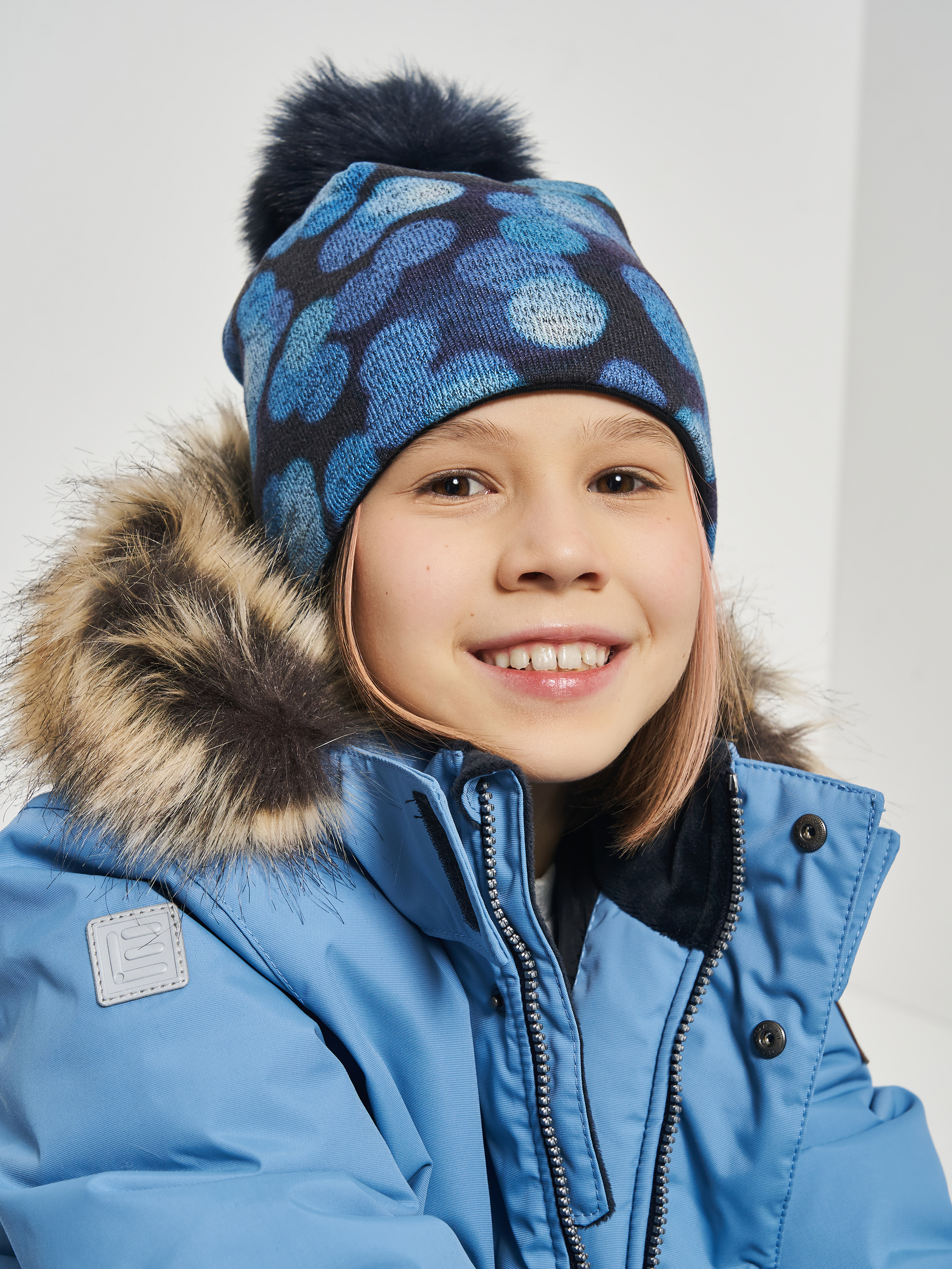 Акция на Дитяча зимова шапка-біні в'язана з помпоном для дівчинки Broel Nikita ZB13643S9BRO-015 53 см Гранатова от Rozetka