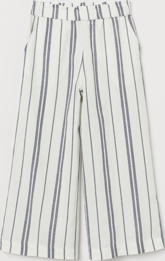 

Брюки H&M 07854449 42 Белые с серым