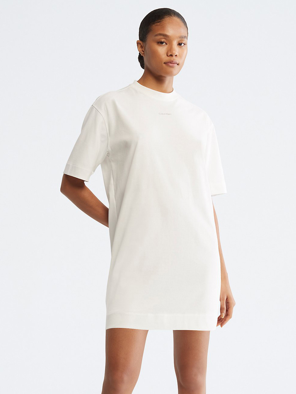 Акція на Сукня-футболка міні літня жіноча Calvin Klein 928825308 XL Біла від Rozetka