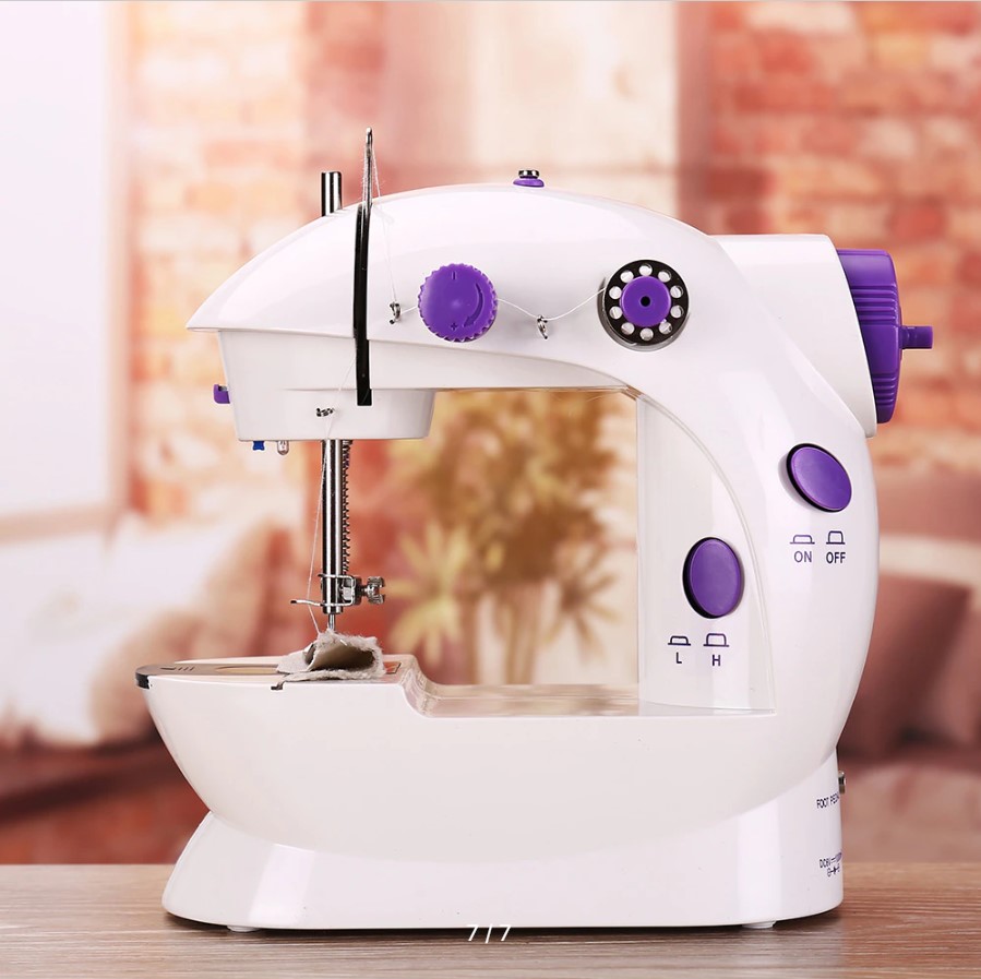 Портативная швейная машинка Mini Sewing SM202A с столом 4 в 1 – фото,  отзывы, характеристики в интернет-магазине ROZETKA от продавца: NEOLINE |  Купить в Украине: Киеве, Харькове, Днепре, Одессе, Запорожье, Львове