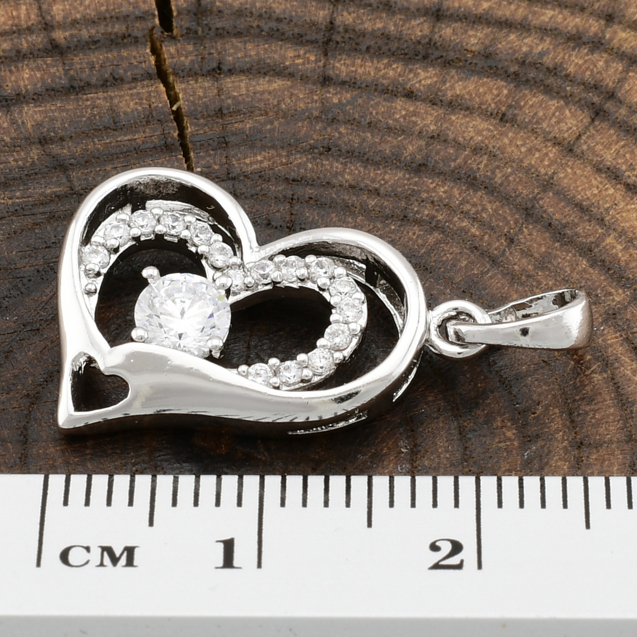 

Кулон Xuping для цепочки до 3 мм 80725 размер 24х18 вес 2 г белые фианиты позолота Белое золото