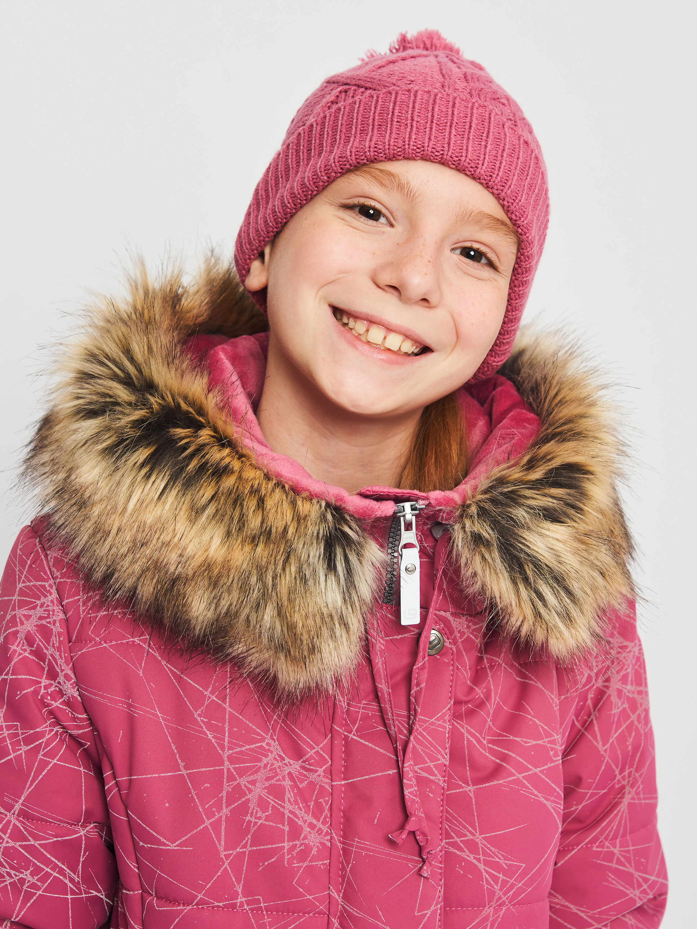 Акція на Дитяча зимова шапка-біні в'язана з помпоном для дівчинки Zippy 1131668 58 Темно-рожева від Rozetka