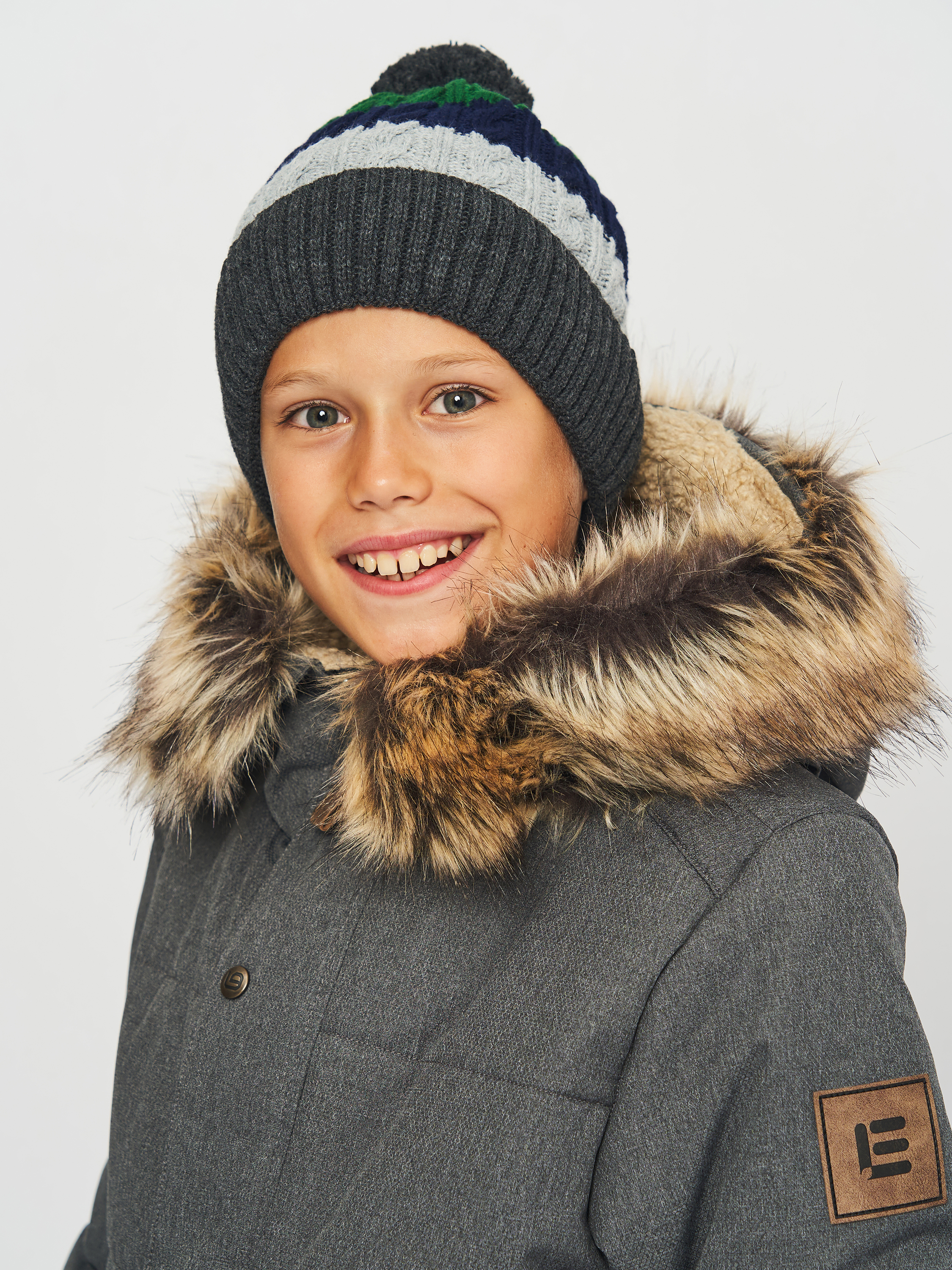 Акція на Дитяча зимова шапка-біні в'язана з помпоном для хлопчика Coccodrillo Accessories Winter Boy ZC2364311AWB-022 48 см Різнокольорова від Rozetka