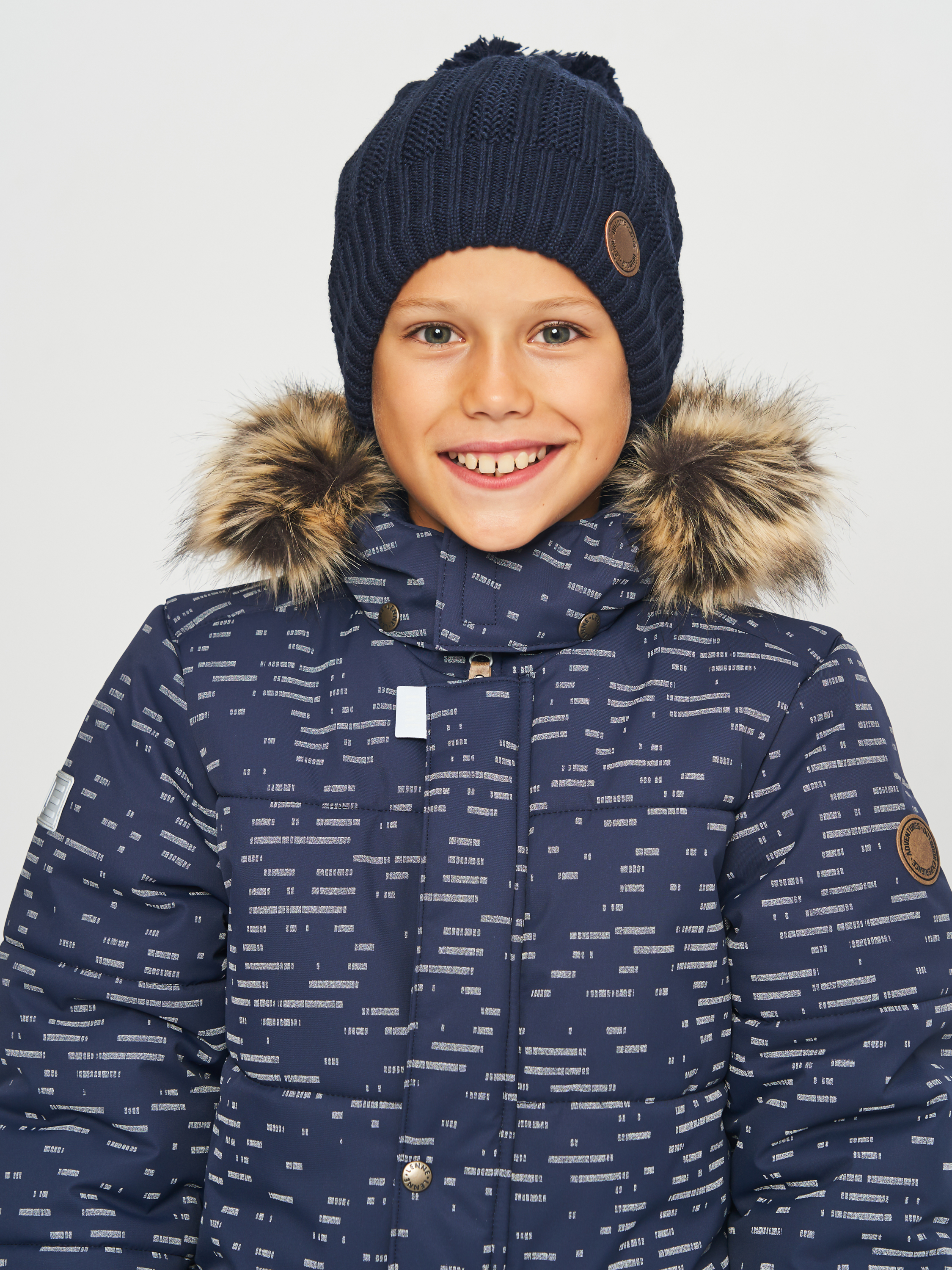 Акція на Дитяча зимова шапка в'язана з помпоном для хлопчика Lenne Diam 23393-229 52 см від Rozetka