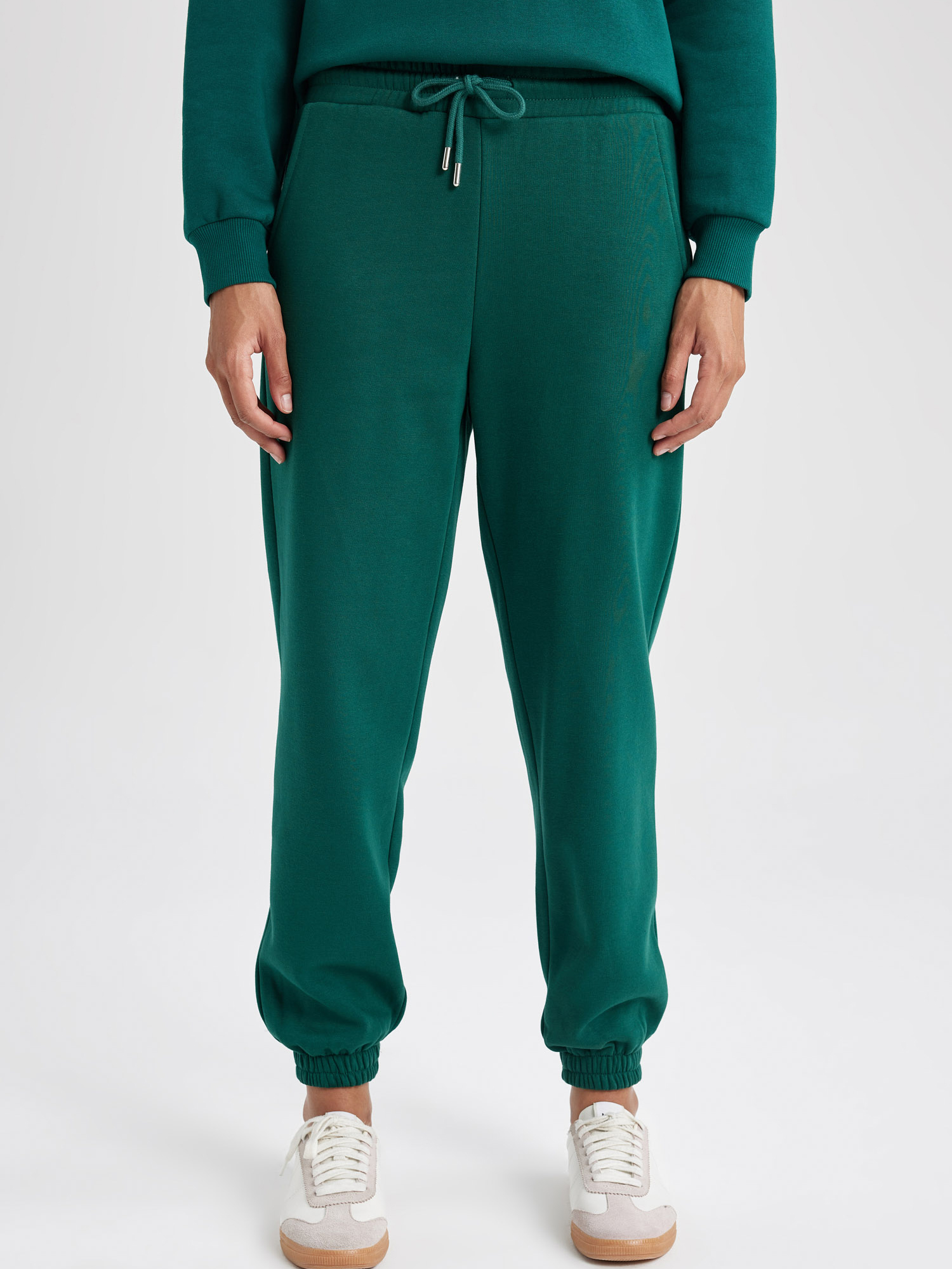 Акция на Спортивні штани жіночі DeFacto V2700AZ-GN671 S Зелені от Rozetka