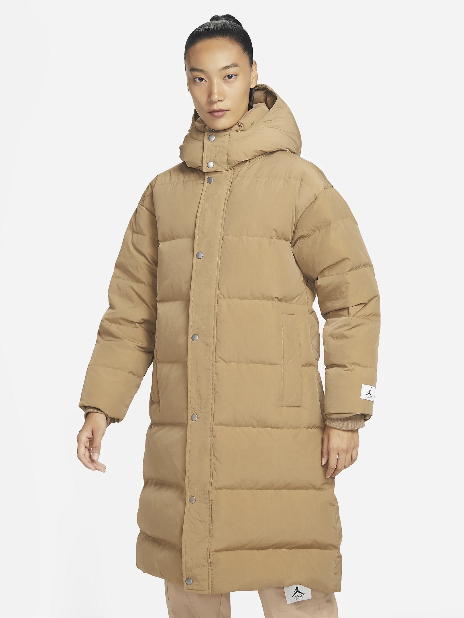 Акція на Куртка зимняя длинная женская Nike AIR Jordan Flight Parka DQ9751-258 M Бежева від Rozetka