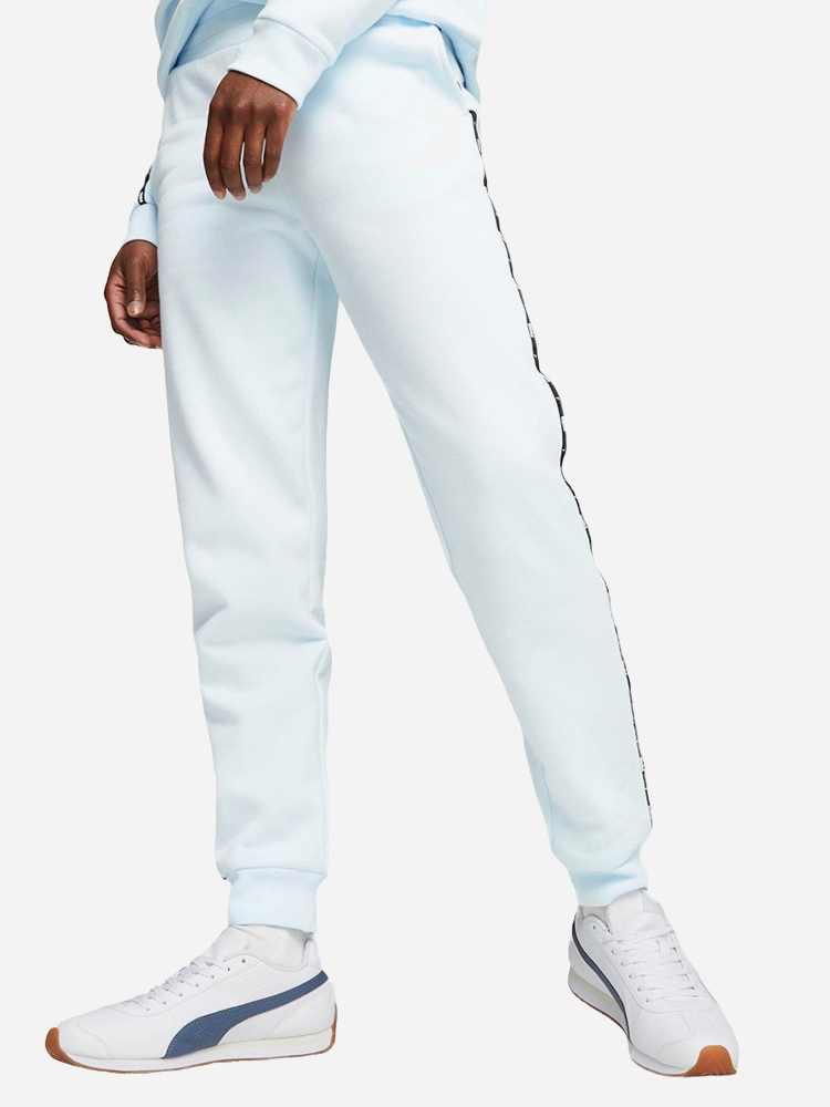 Акція на Спортивні штани жіночі Puma Ess Tape Sweatpants Fl Cl Icy 67599969 L Блакитні від Rozetka