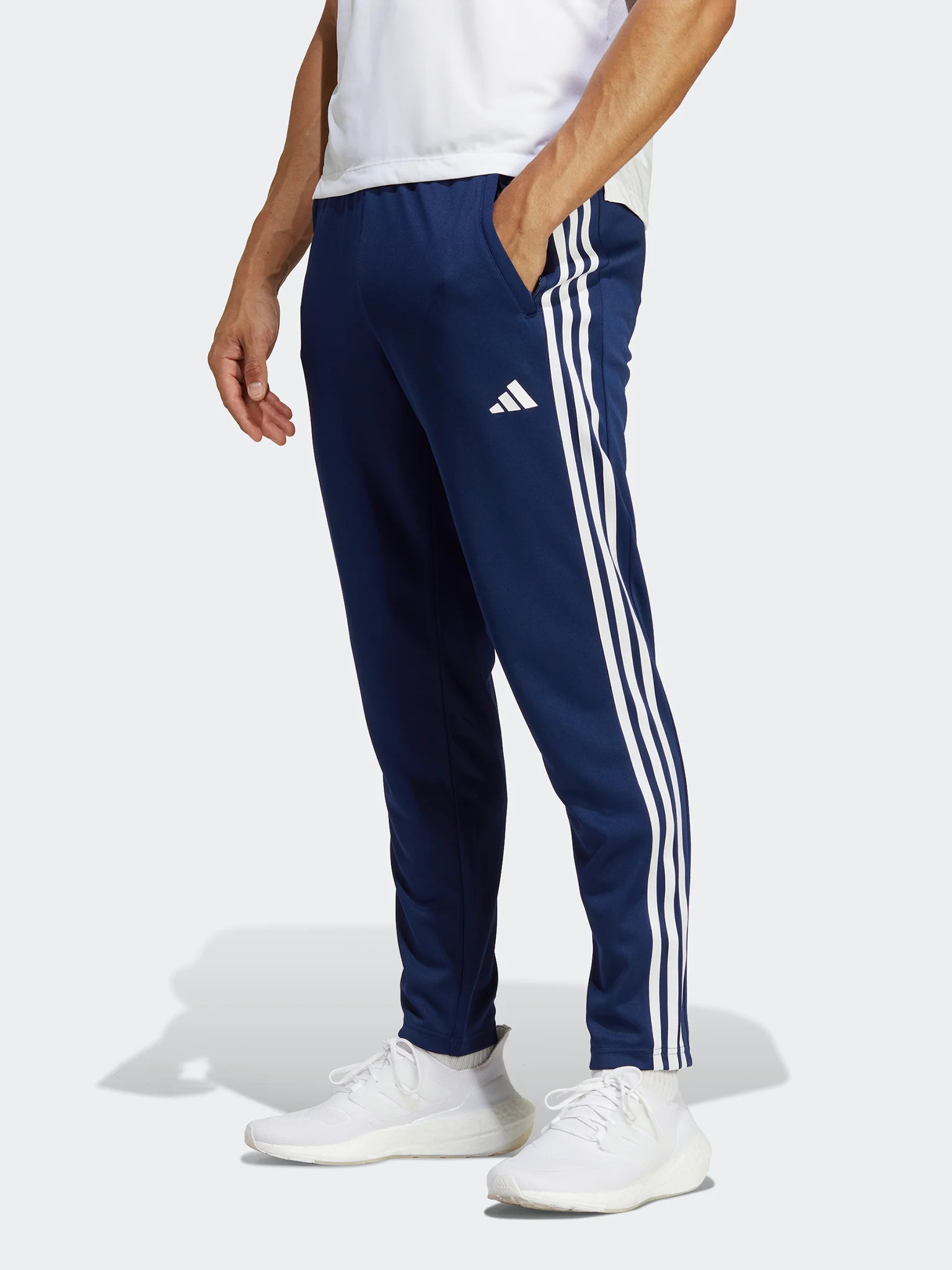 Акція на Спортивні штани чоловічі Adidas TR-ES BASE 3PT IB8169 M Dkblue/White від Rozetka