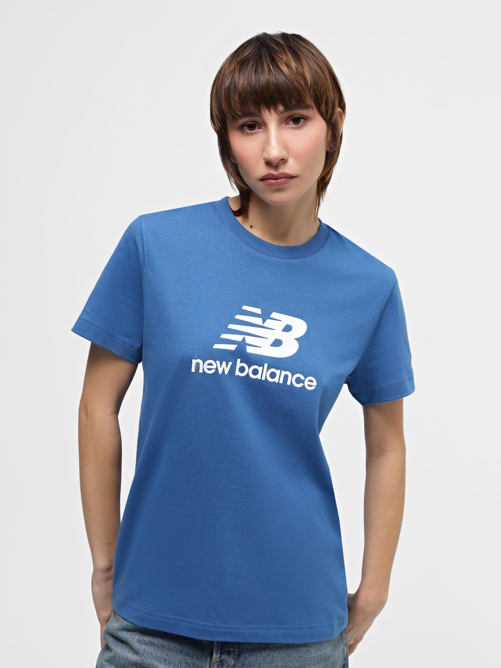 Акція на Футболка довга жіноча New Balance Stacked Logo WT41502BEU S Блакитна від Rozetka