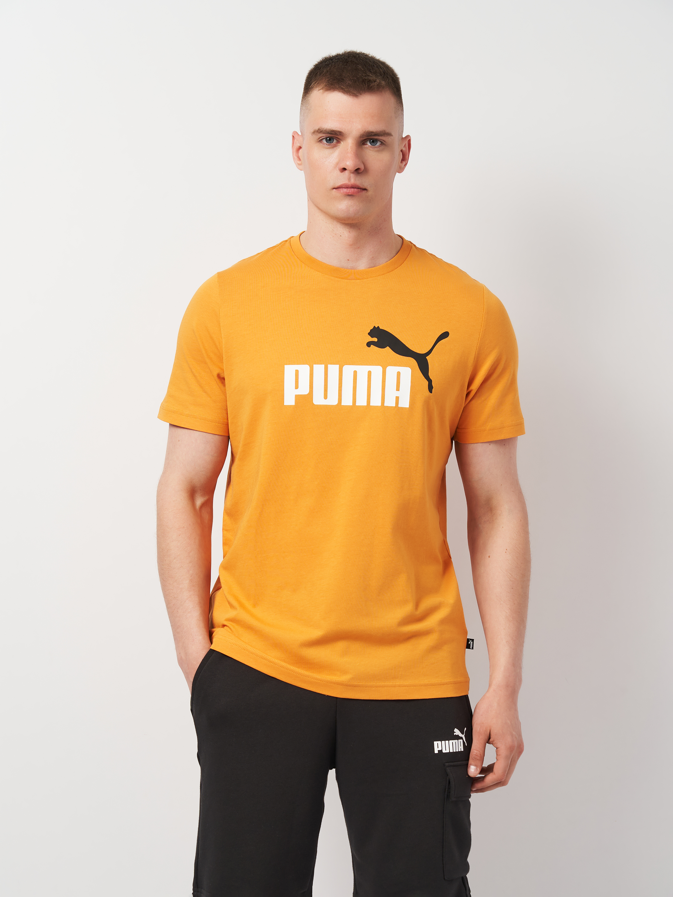 Акція на Футболка чоловіча Puma Essentials+ 58675996 2XL Жовта з принтом від Rozetka
