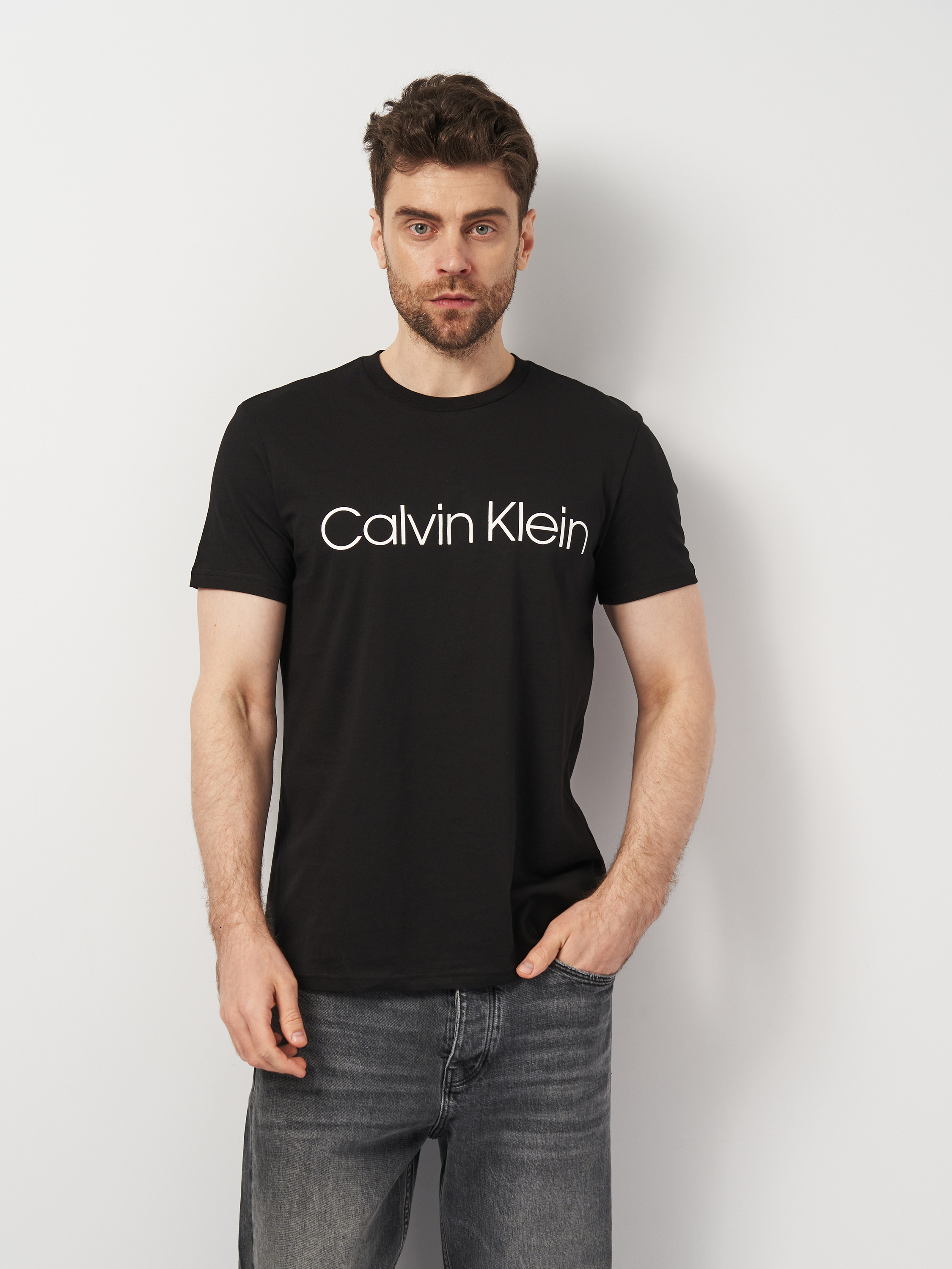 Акція на Футболка чоловіча Calvin Klein Jeans 11322.1 2XL (52) Чорна від Rozetka