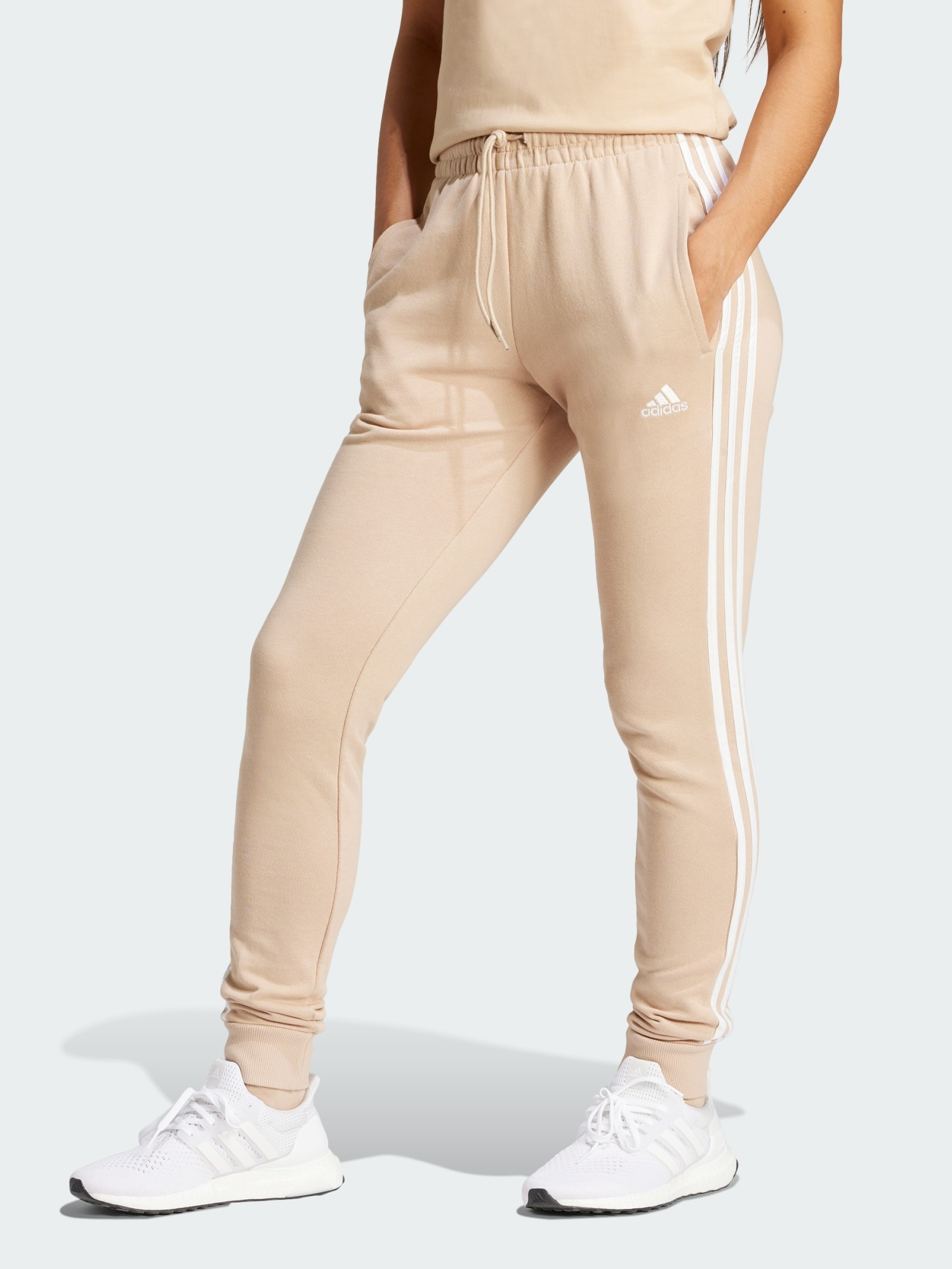 Акція на Спортивні штани жіночі Adidas W 3S Ft Cf Pt IR5378 M Magic Beige від Rozetka