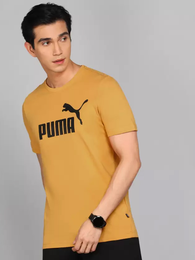 Акція на Футболка чоловіча Puma Essentials Foundation 58666795 L Жовта з принтом від Rozetka