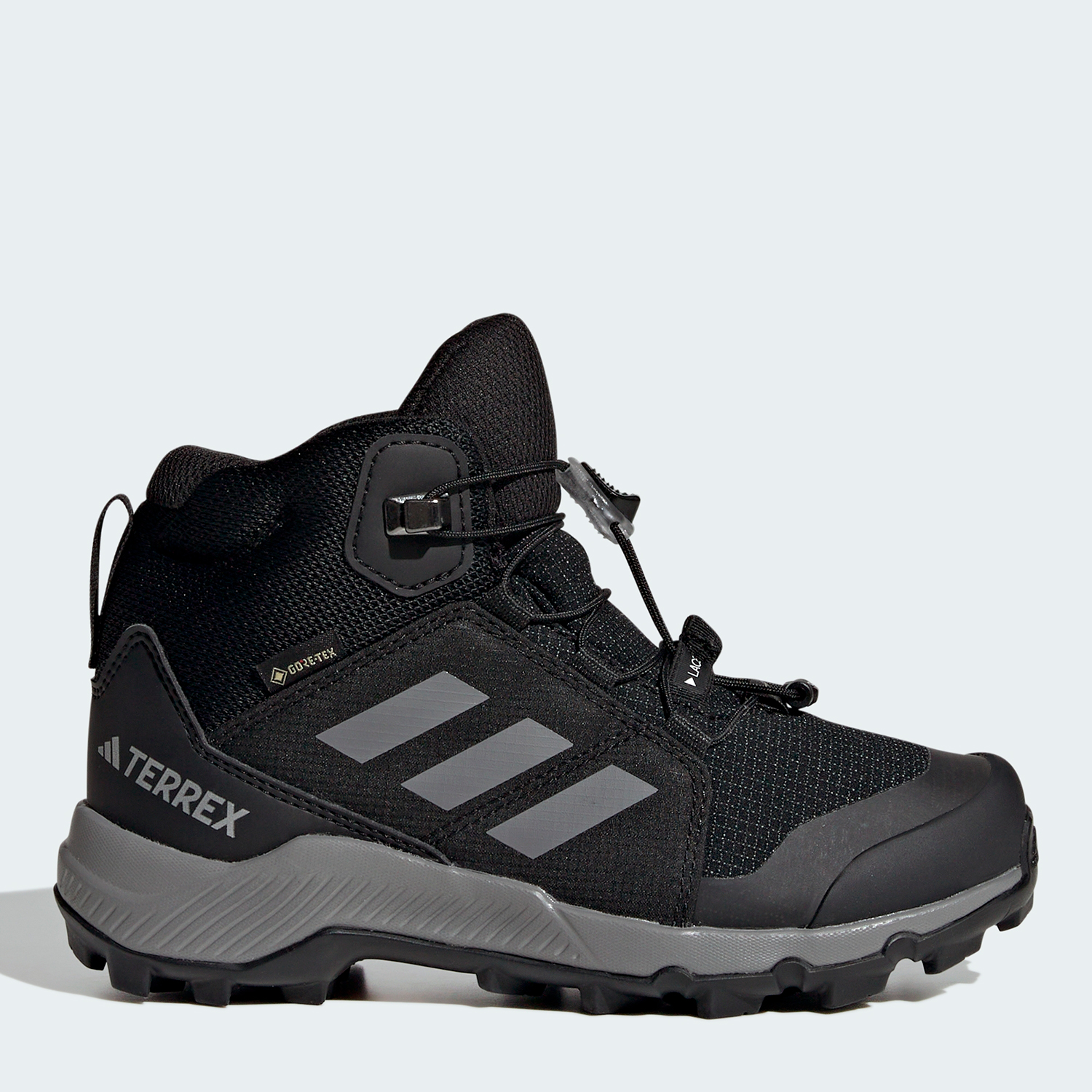 Акція на Дитячі демісезонні черевики для хлопчика Adidas Terrex Mid Gtx K IF7522 31.5 Чорні від Rozetka