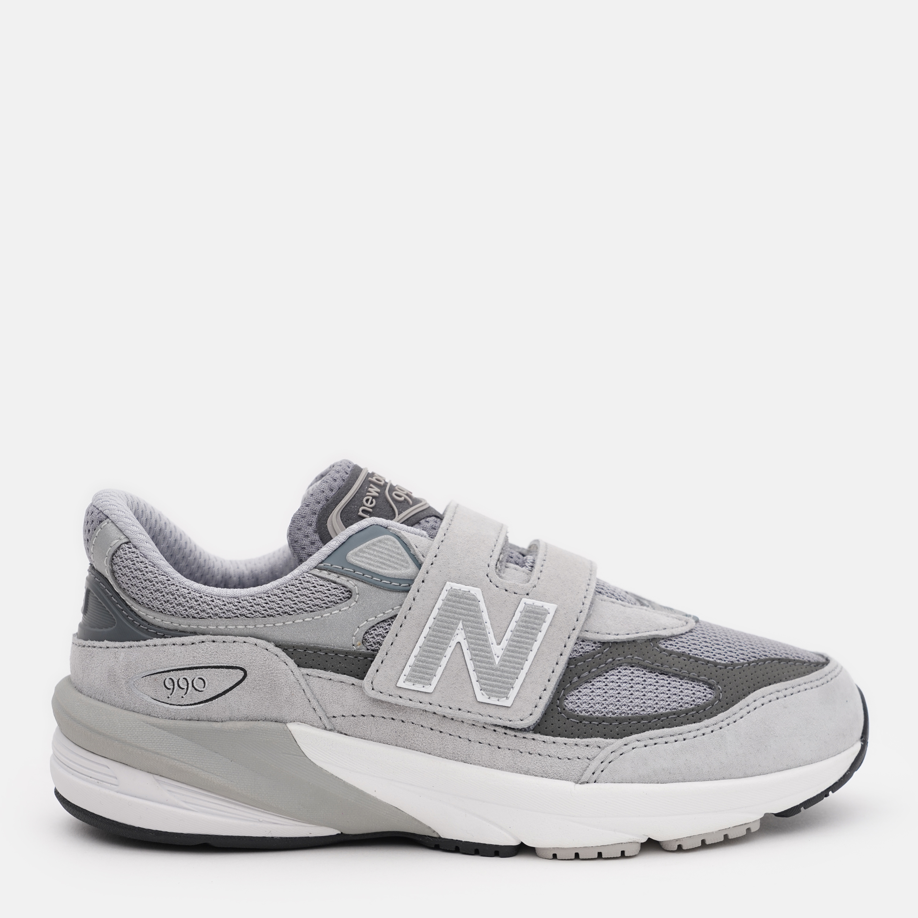 Акція на Підліткові кросівки для хлопчика New Balance PV990GL6 35 (2.5) Сірі з чорним від Rozetka