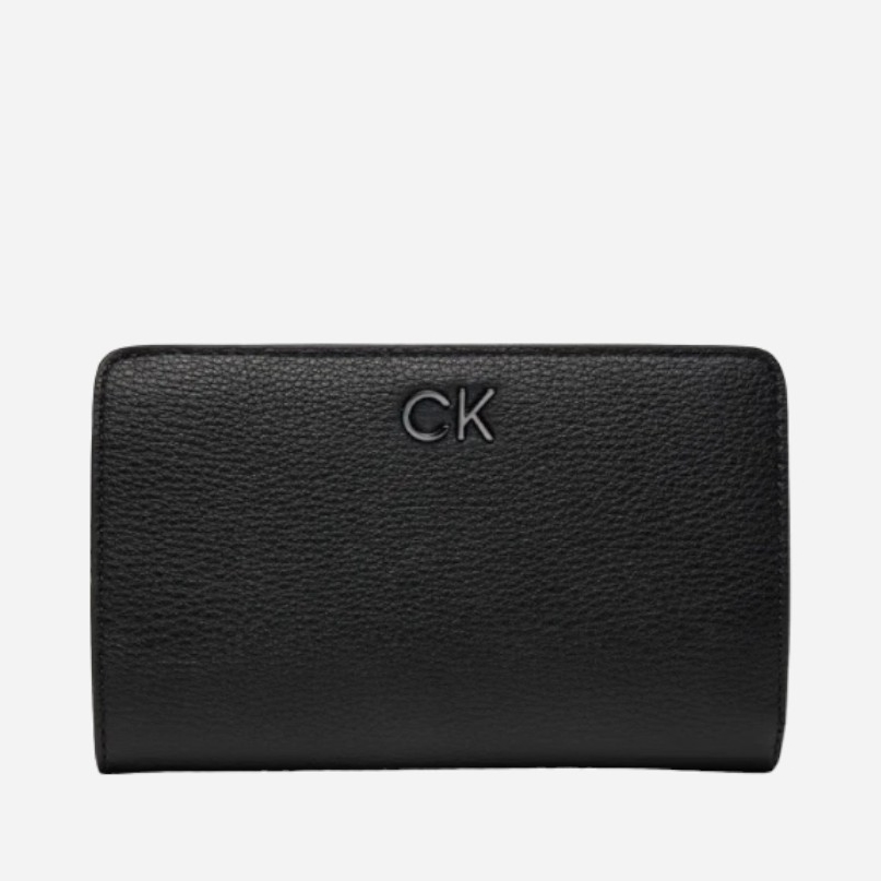 Акція на Гаманець жіночий зі штучної шкіри Calvin Klein K60K612638-BEH Чорний від Rozetka