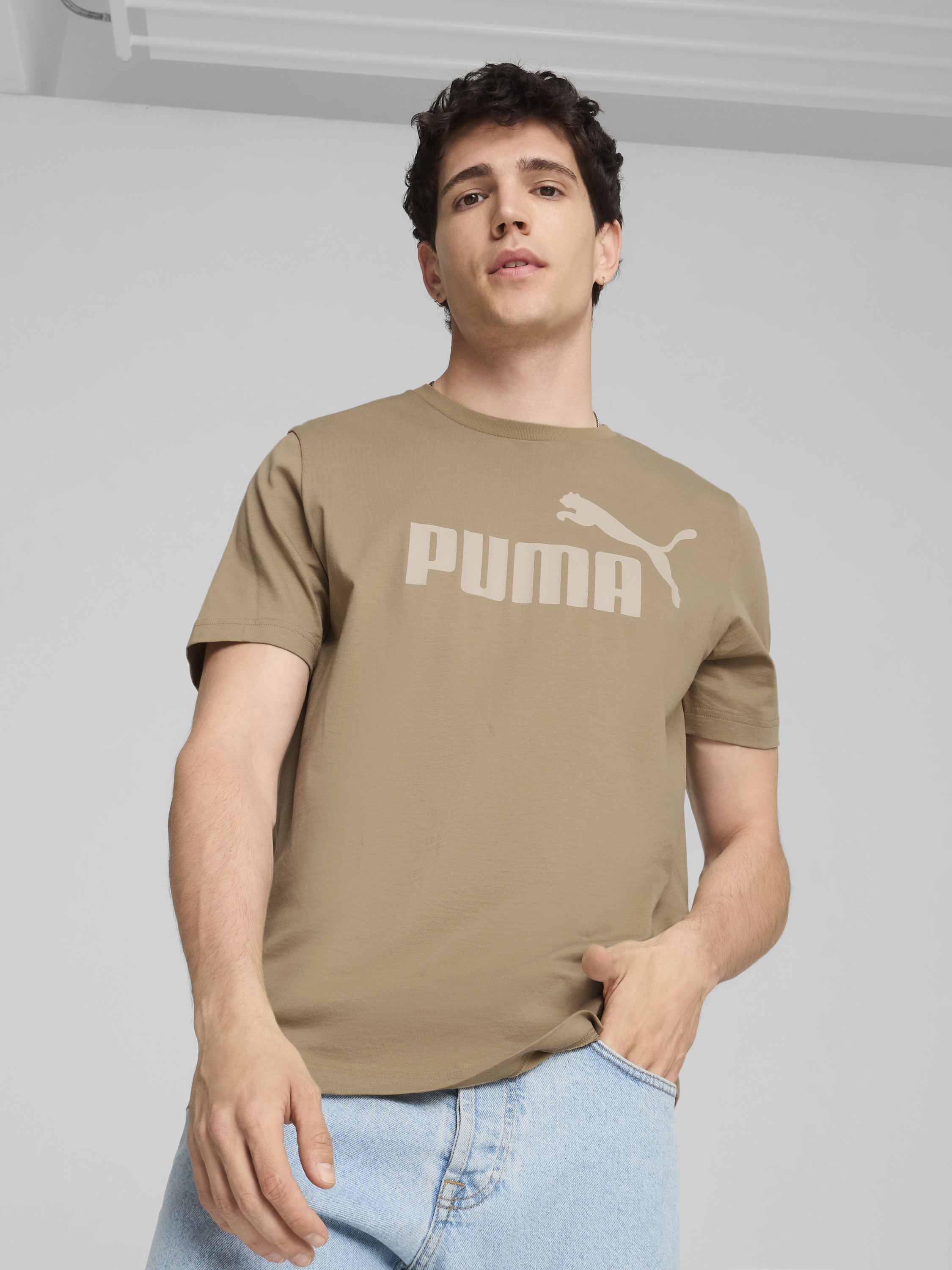 Акція на Футболка бавовняна чоловіча Puma Ess Logo Tee 58666713 L Коричнева від Rozetka