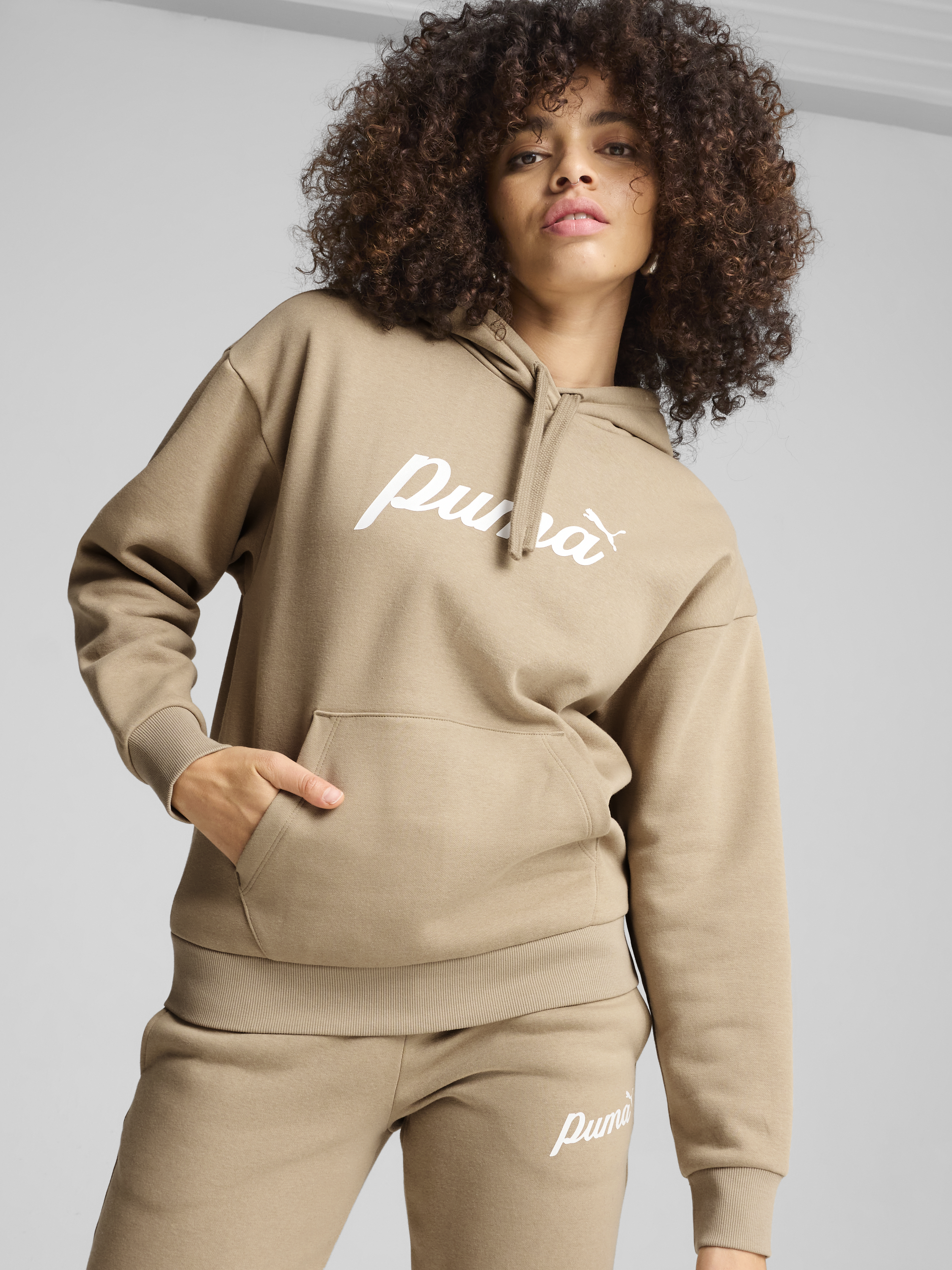 Акція на Худі тепле жіноче Puma Ess+ Script Hoodie Fl 68153467 S Бежеве від Rozetka