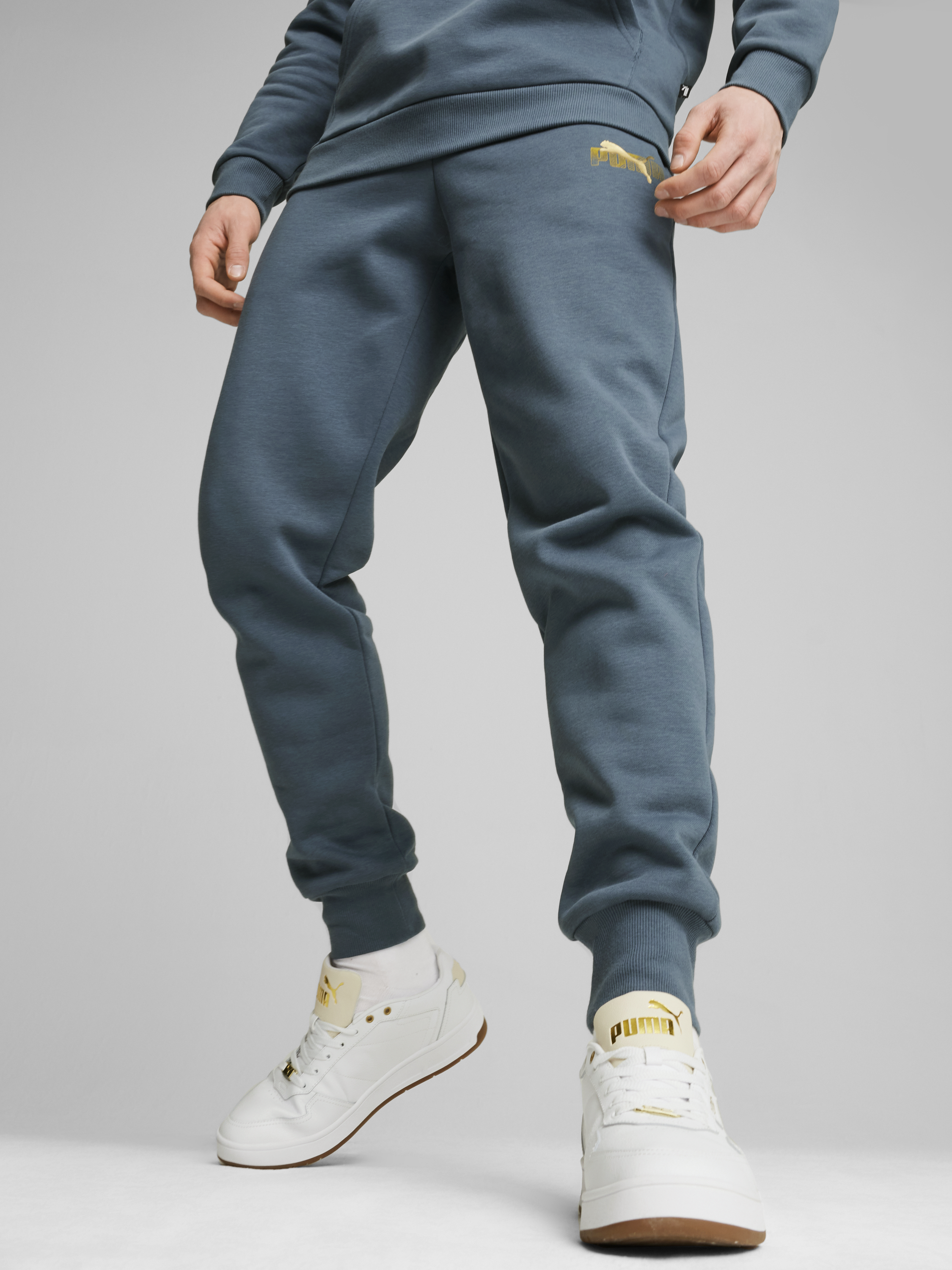 Акція на Спортивні штани чоловічі Puma Ess+ Logo Lab Sweatpants 68185325 XL Зелені від Rozetka