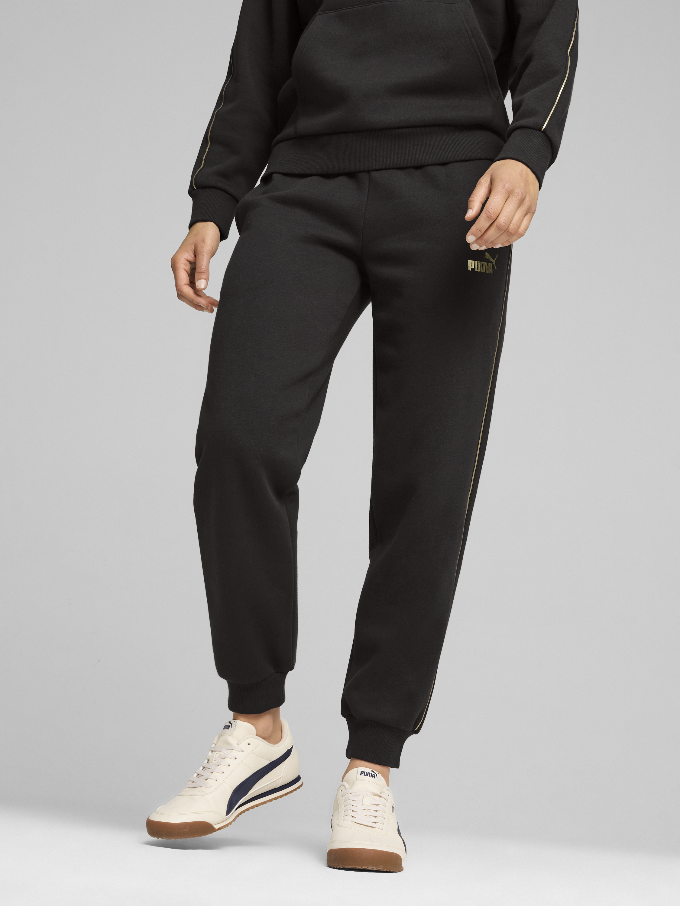 Акція на Спортивні штани на флісі жіночі Puma Minimal Gold Sweatpants Fl 68529601 S Чорні від Rozetka