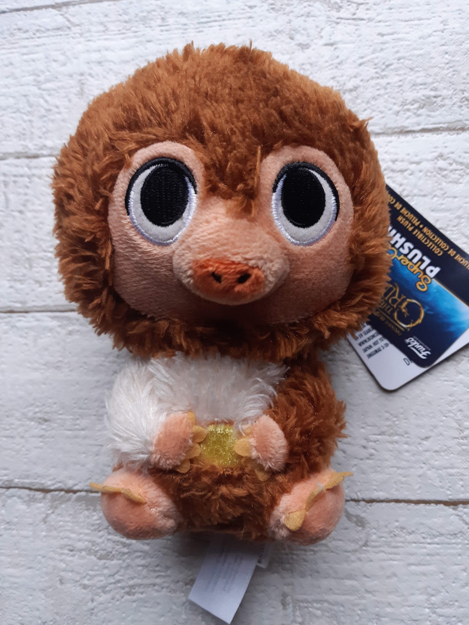 

Мягкая игрушка Funko Фантастические звери Нифлер коричнево-белый 15см 31907