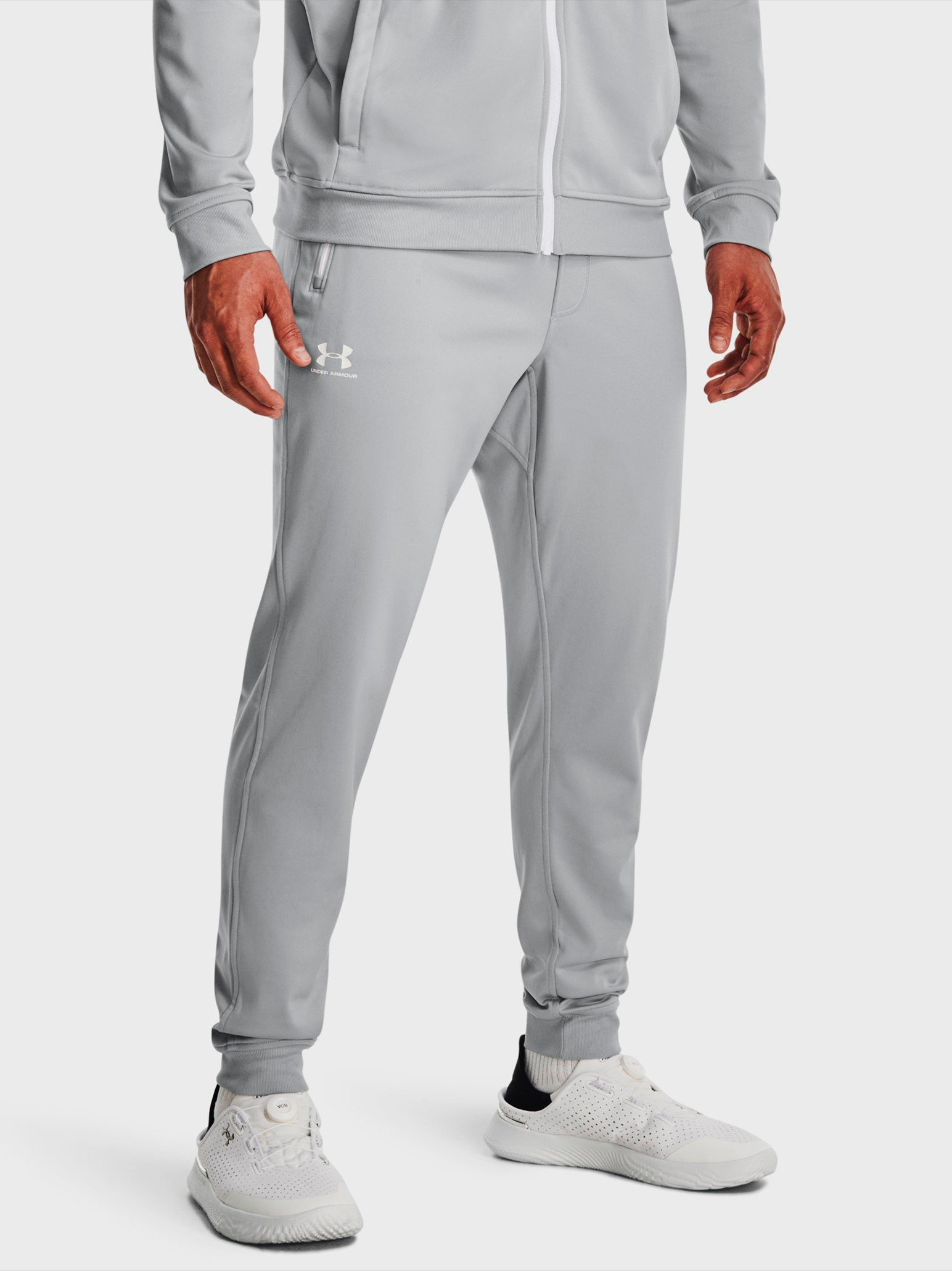 Акція на Спортивні штани чоловічі Under Armour Sportstyle Tricot Jogger 1290261-011 M Сірі від Rozetka