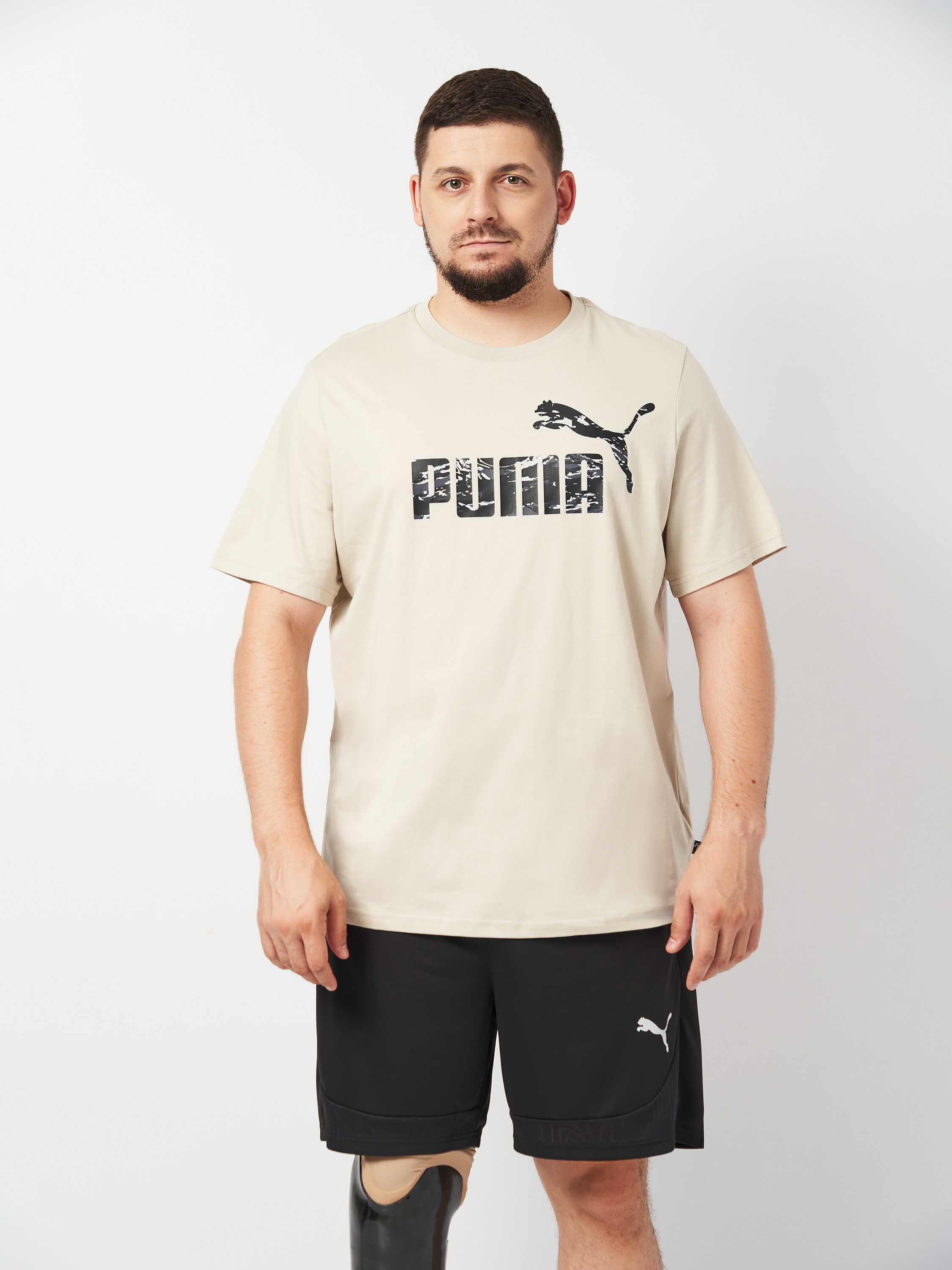 Акція на Футболка бавовняна чоловіча Puma Ess+ Camo Graphic Tee 68323668 M Бежева від Rozetka