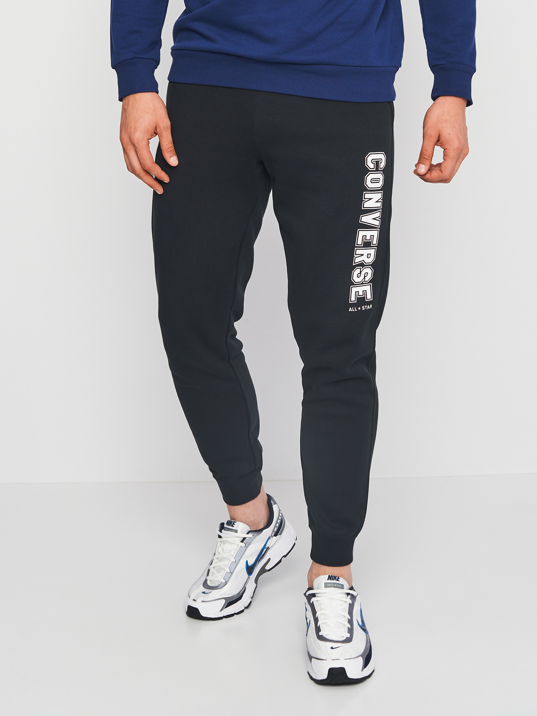 Акція на Спортивні штани чоловічі Converse Stand Fit All Star Print Pant Black 10025410-001 M від Rozetka