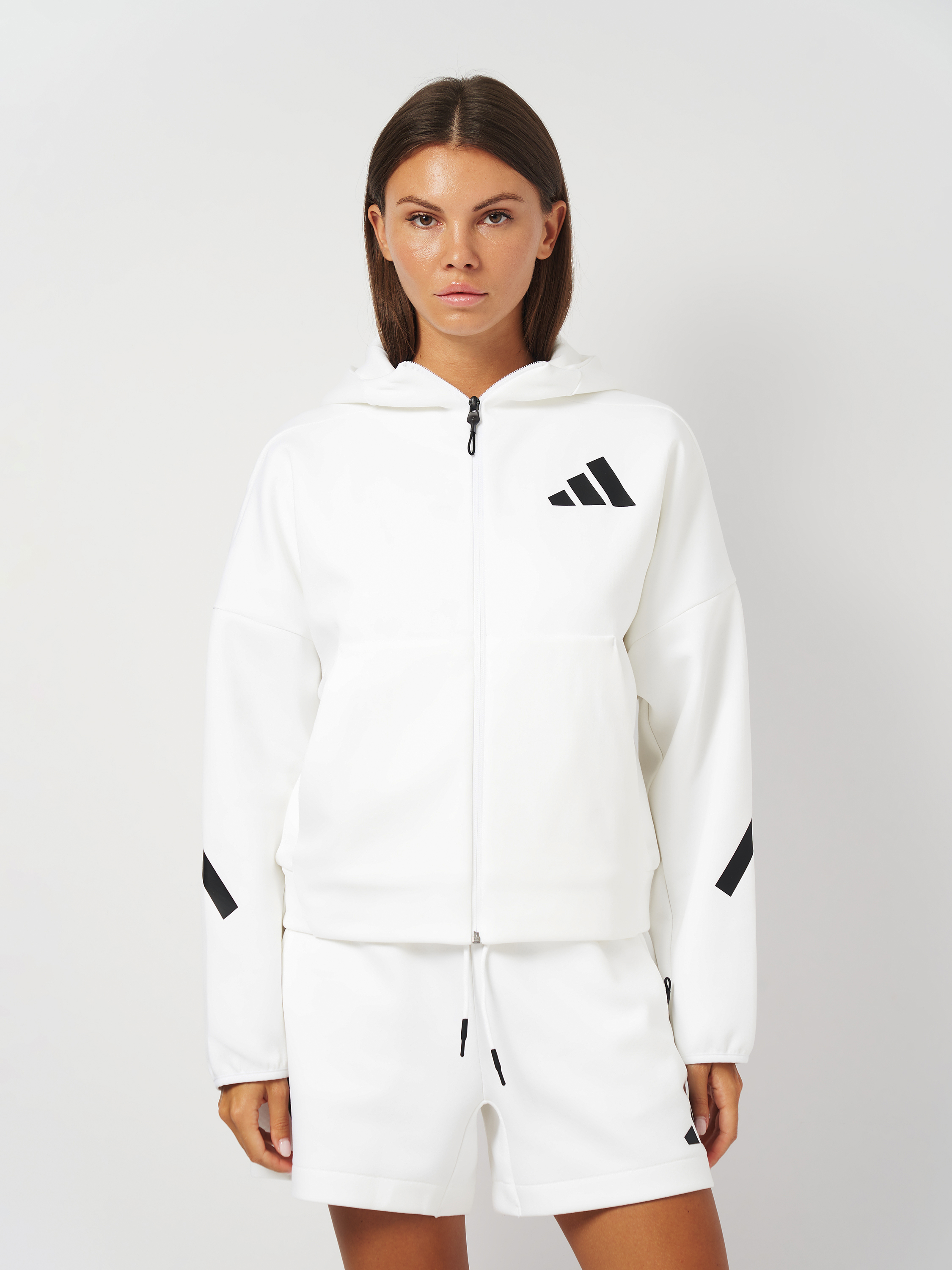 Акція на Толстовка жіноча Adidas W Z.N.E. Fz JE7849 XS White від Rozetka