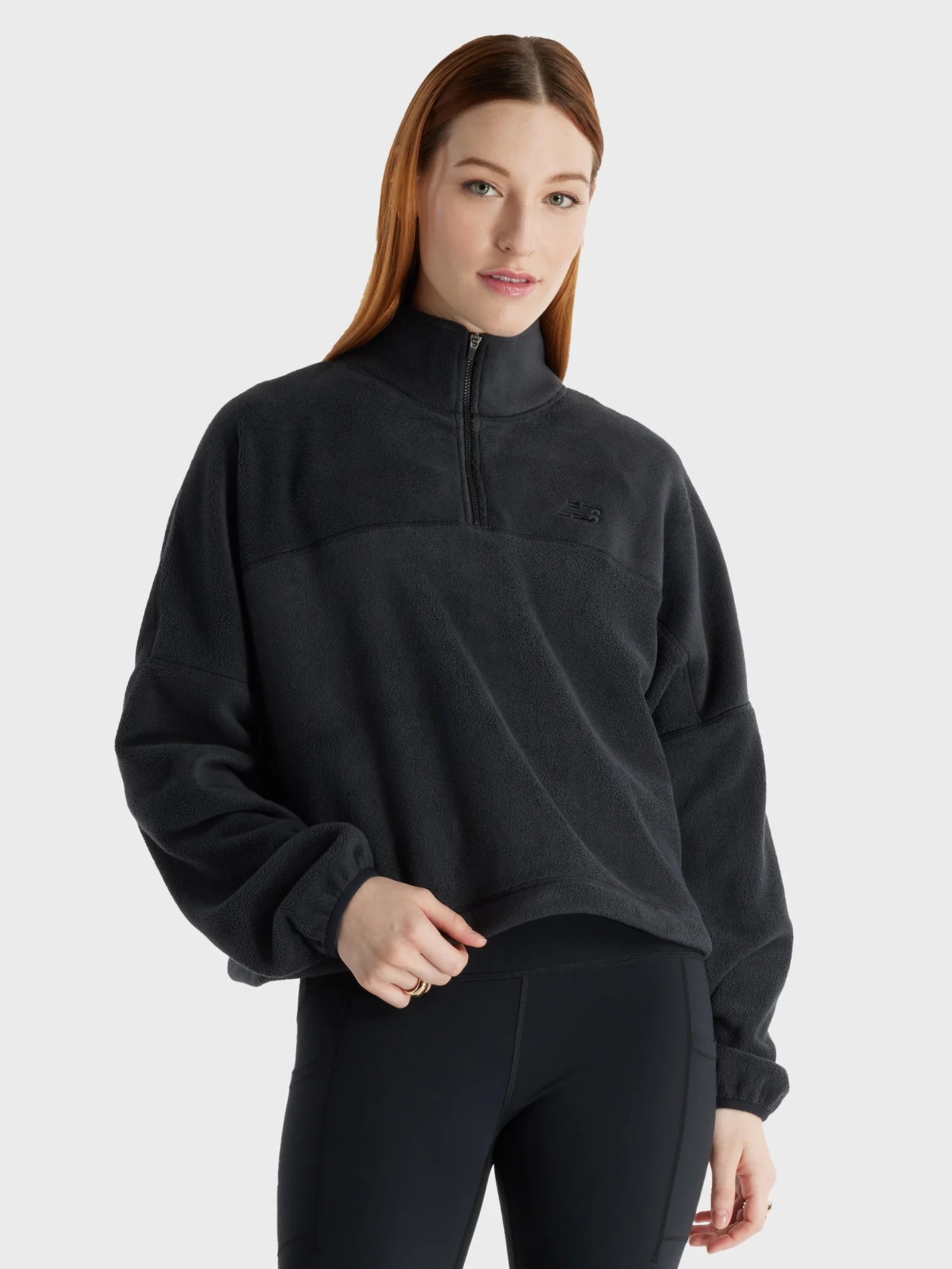 Акція на Толстовка на блискавці утеплена без капюшона жіноча New Balance Polar Fleece HZ WT43529BK XS Чорна від Rozetka