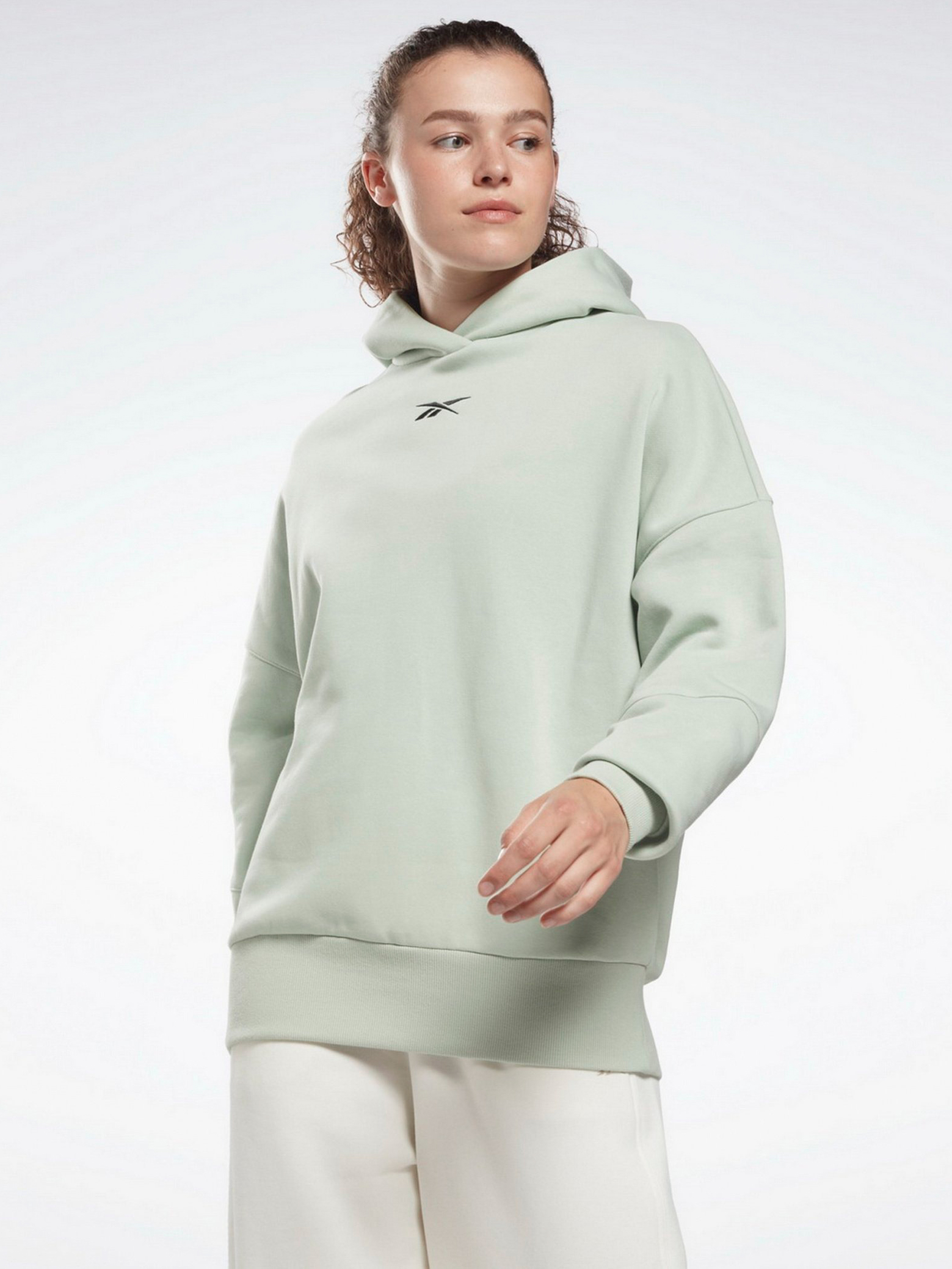 Акція на Худі оверсайз жіноче Reebok Lux Hoodie H51829 2XS М'ятне від Rozetka