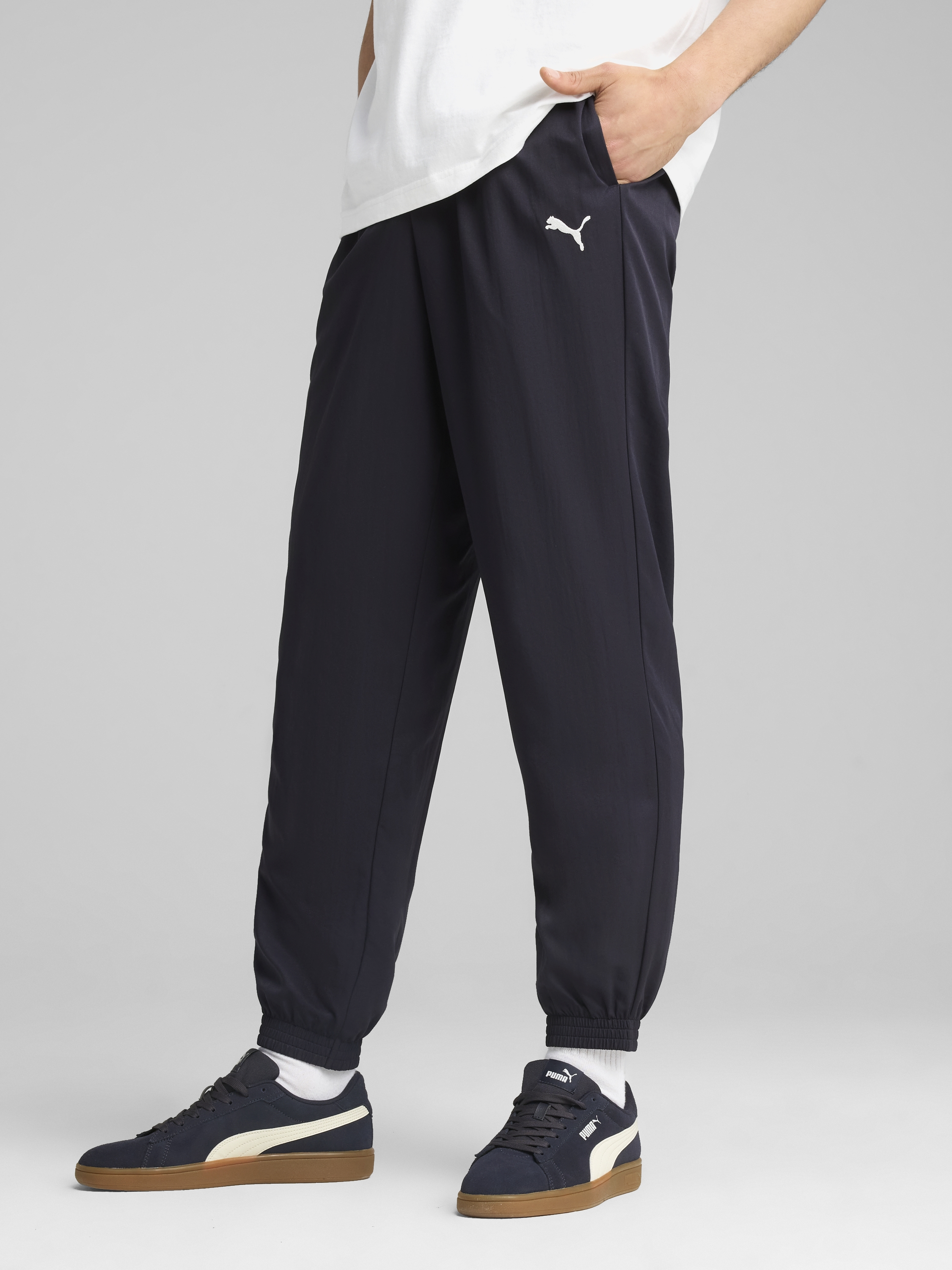 Акція на Спортивні штани чоловічі Puma Ess Woven Pants Cl 68262216 S New Navy від Rozetka