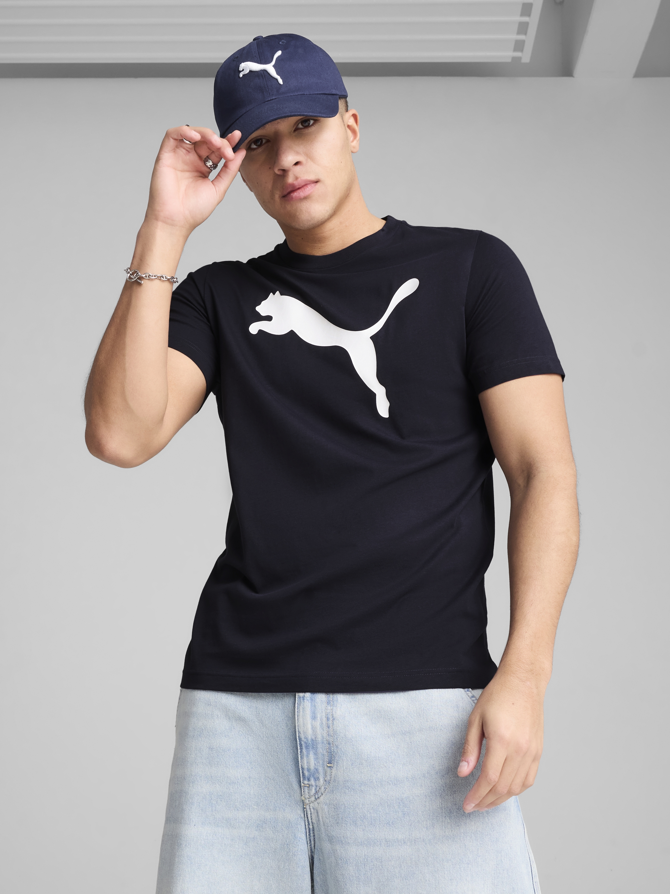 Акція на Футболка бавовняна довга чоловіча Puma Ess Tee 68253616 M New Navy з принтом від Rozetka