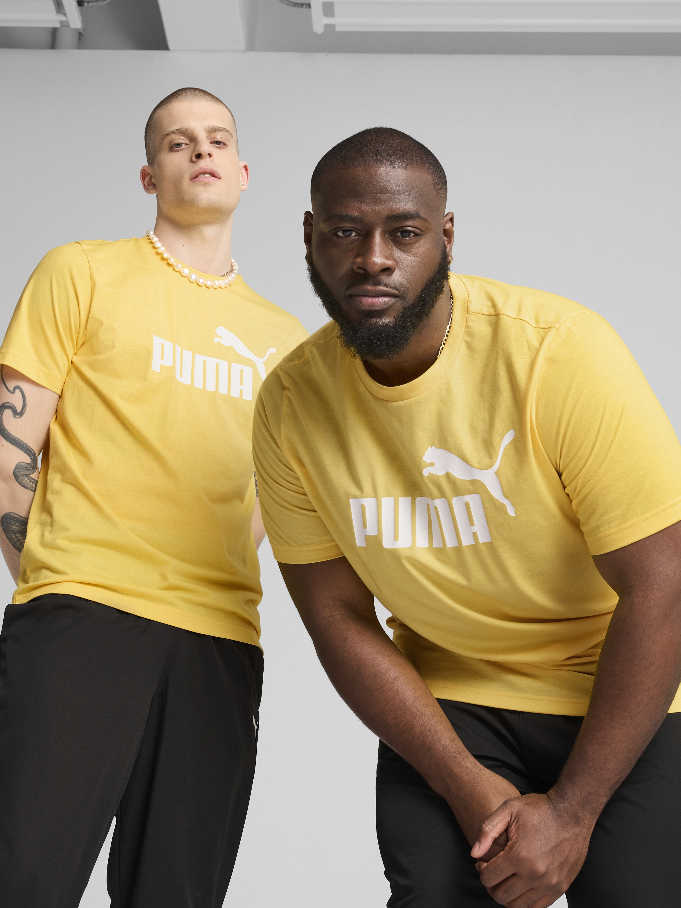 Акція на Футболка бавовняна довга чоловіча Puma Ess No. 1 Logo Heather Tee (S) 68255155 XL Sunny Yellow з принтом від Rozetka