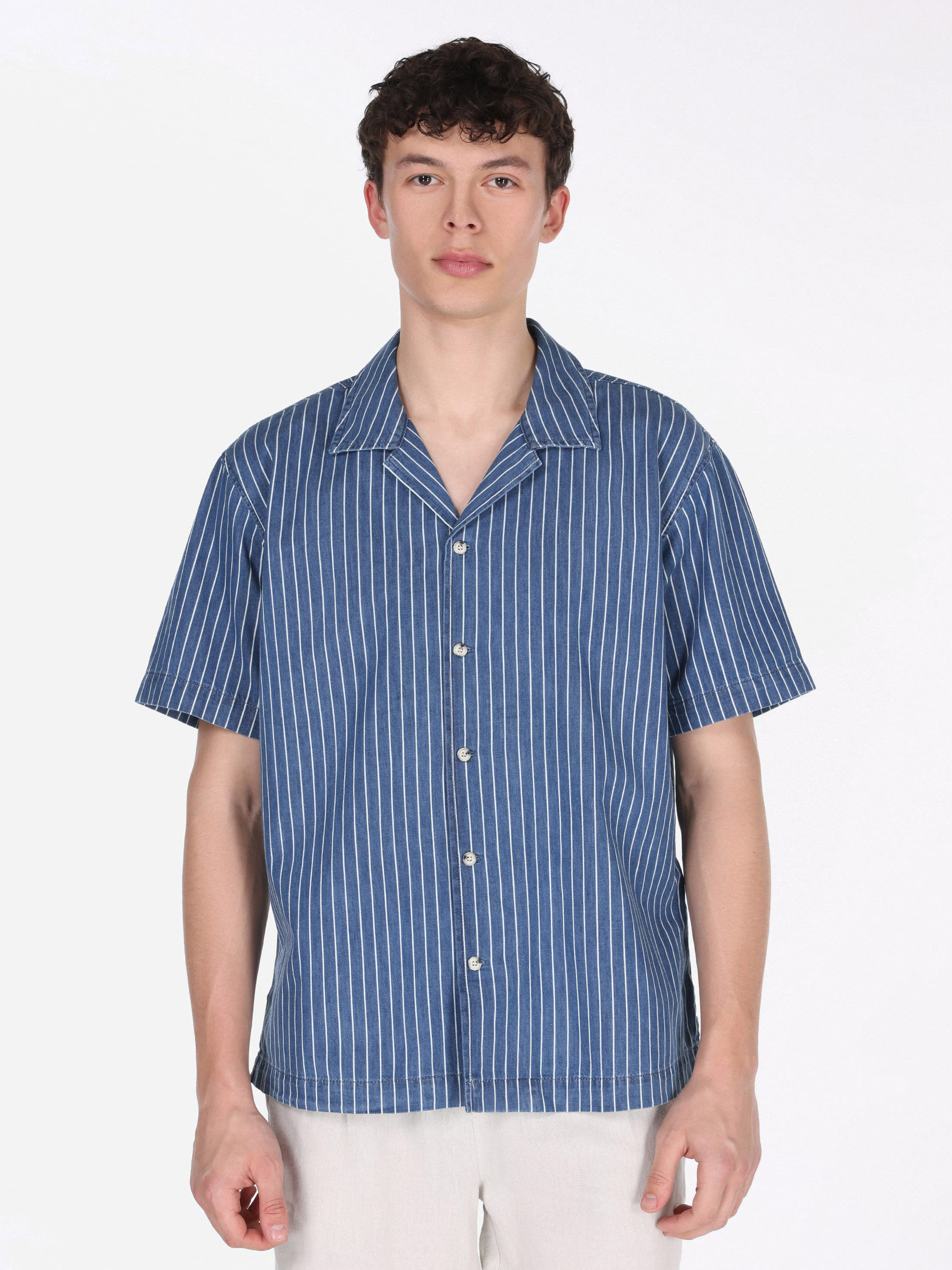 Акція на Сорочка джинсова літня оверсайз чоловіча Colin's CL1075129DN44320 L Strey Wash від Rozetka