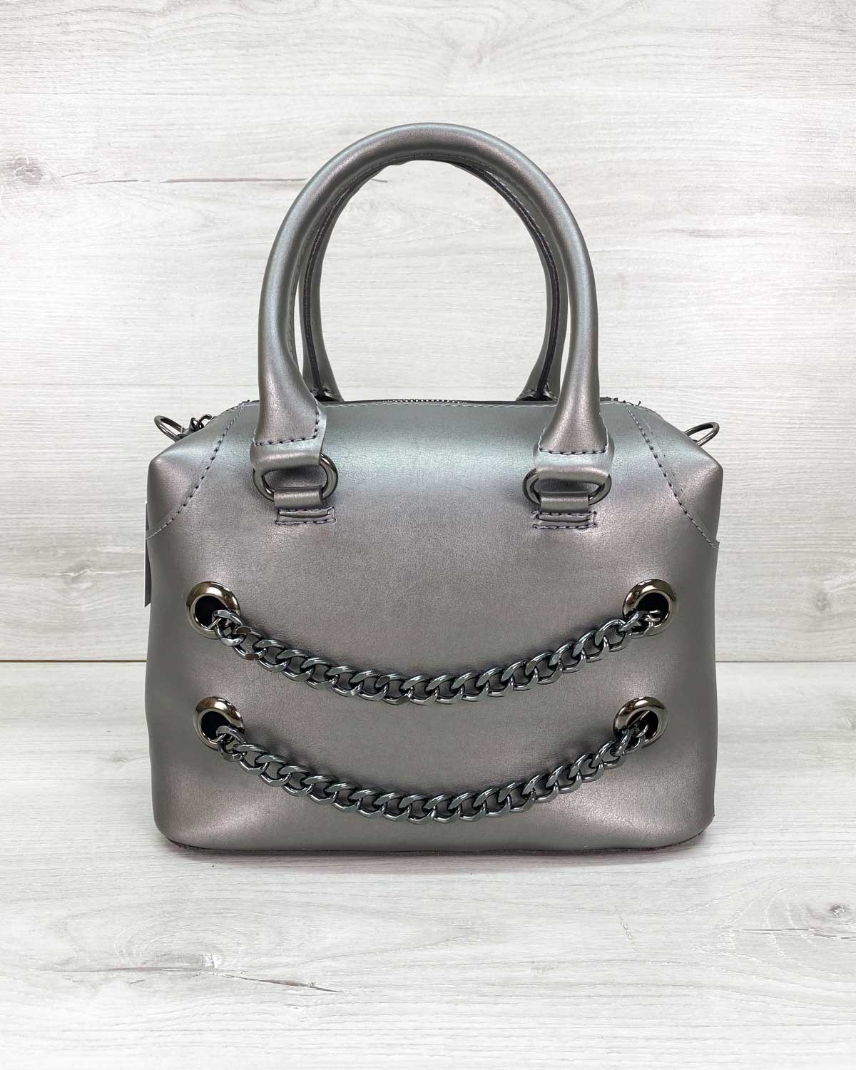 

Женская сумка «Jean» WeLassie 18х12х25 см Металлик