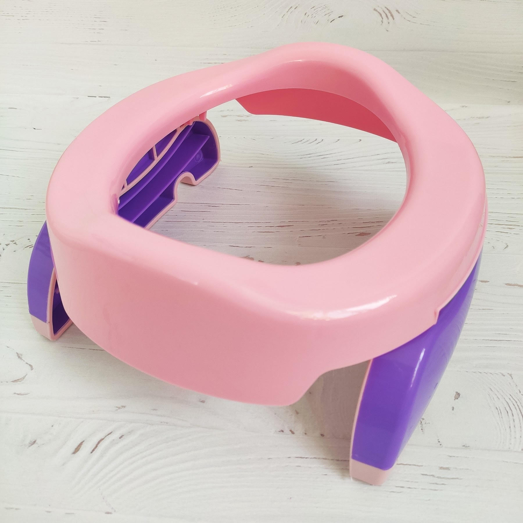 

Дорожный складной горшок + накладка на унитаз, 10 одноразовых пакетов в комплекте для детей от 15 мес Potette Plus Розовый