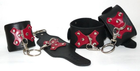 Кожаные наручники и поножи с декоративной вставкой цвет черный (17653023000000000) - изображение 1