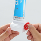 Дозатор витискач для зубної пасти Rolling Tube Red
