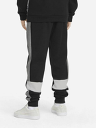 Dziecięce spodnie dresowe ciepłe polarowe dla chłopca Puma Ess+ Colorblock Pants Fl Cl B 849083-01 116 cm Czarne (4064535821512) - obraz 2