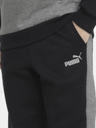 Dziecięce spodnie dresowe ciepłe polarowe dla chłopca Puma Ess+ Colorblock Pants Fl Cl B 849083-01 116 cm Czarne (4064535821512) - obraz 4