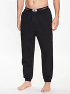 Spodnie dresowe męskie Calvin Klein Underwear 000NM2393E-UB1 L Czarne (8720107557154) - obraz 1