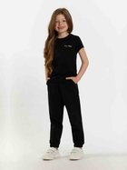 Koszulka dziecięca dla dziewczynki Tup Tup 101500-1010 104 cm Czarna (5907744500368) - obraz 1