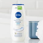 Zestaw kosmetyków do pielęgnacji Nivea Original Care Balsam do ciała 400 ml + Żel pod prysznic 250 ml + Antyperspirant w kulce 50 ml + Pomadka do ust 4.8 g (9005800364360) - obraz 7