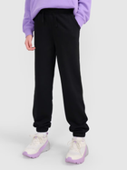 Spodnie dresowe dziecięce dla dziewczynki joggery 4F 4FJWMM00TTROF1189-20S 128 cm Czarne (5905700384656)